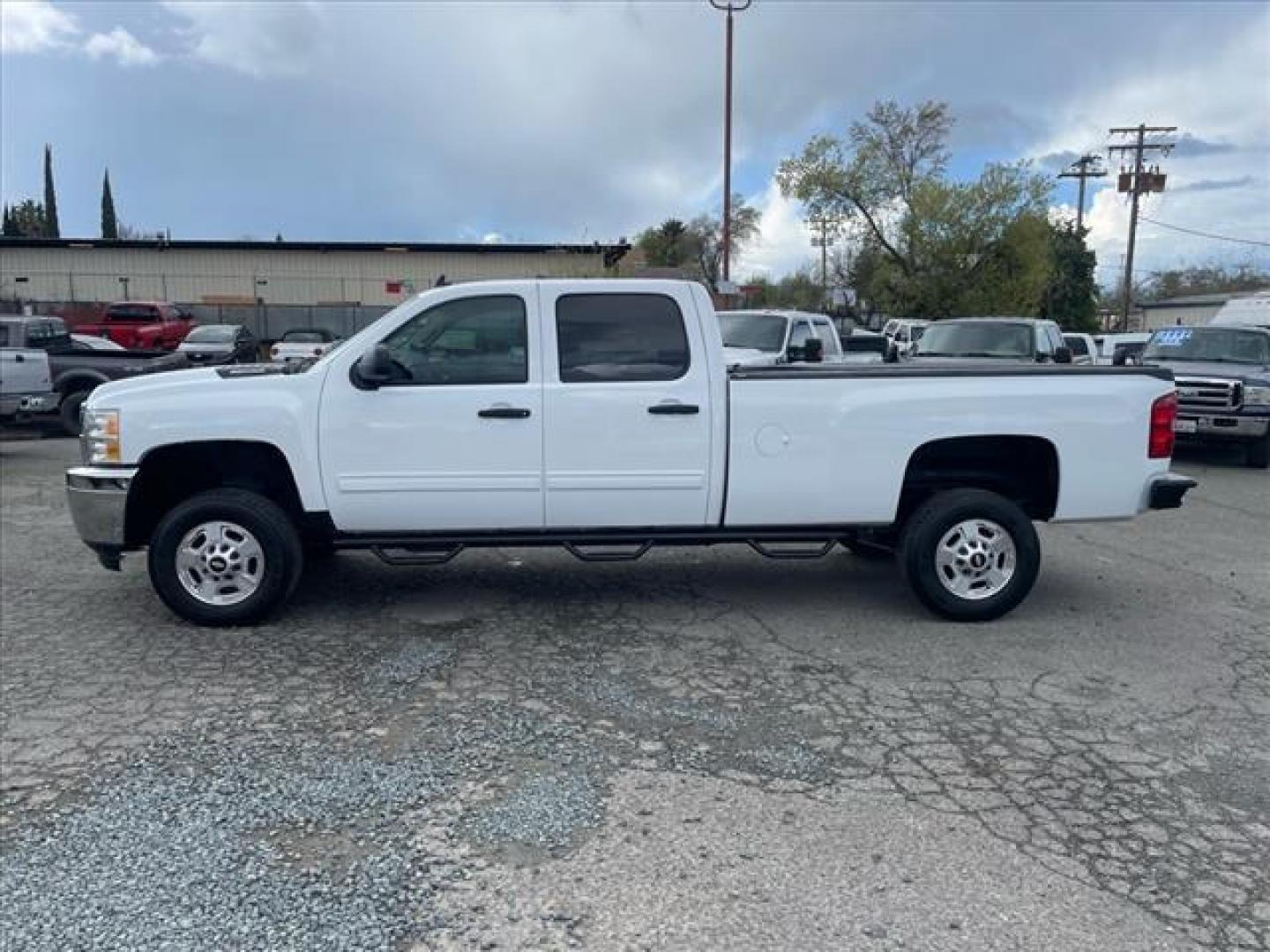 2013 Summit White Chevrolet Silverado 2500HD LT (1GC1KXE83DF) with an 6.6L Duramax 6.6L Diesel Turbo V8 397hp 765ft. lbs. Common Rail Direct Injection engine, Allison 1000 6-Speed Shiftable Automatic transmission, located at 800 Riverside Ave, Roseville, CA, 95678, (916) 773-4549, 38.732265, -121.291039 - Photo#4