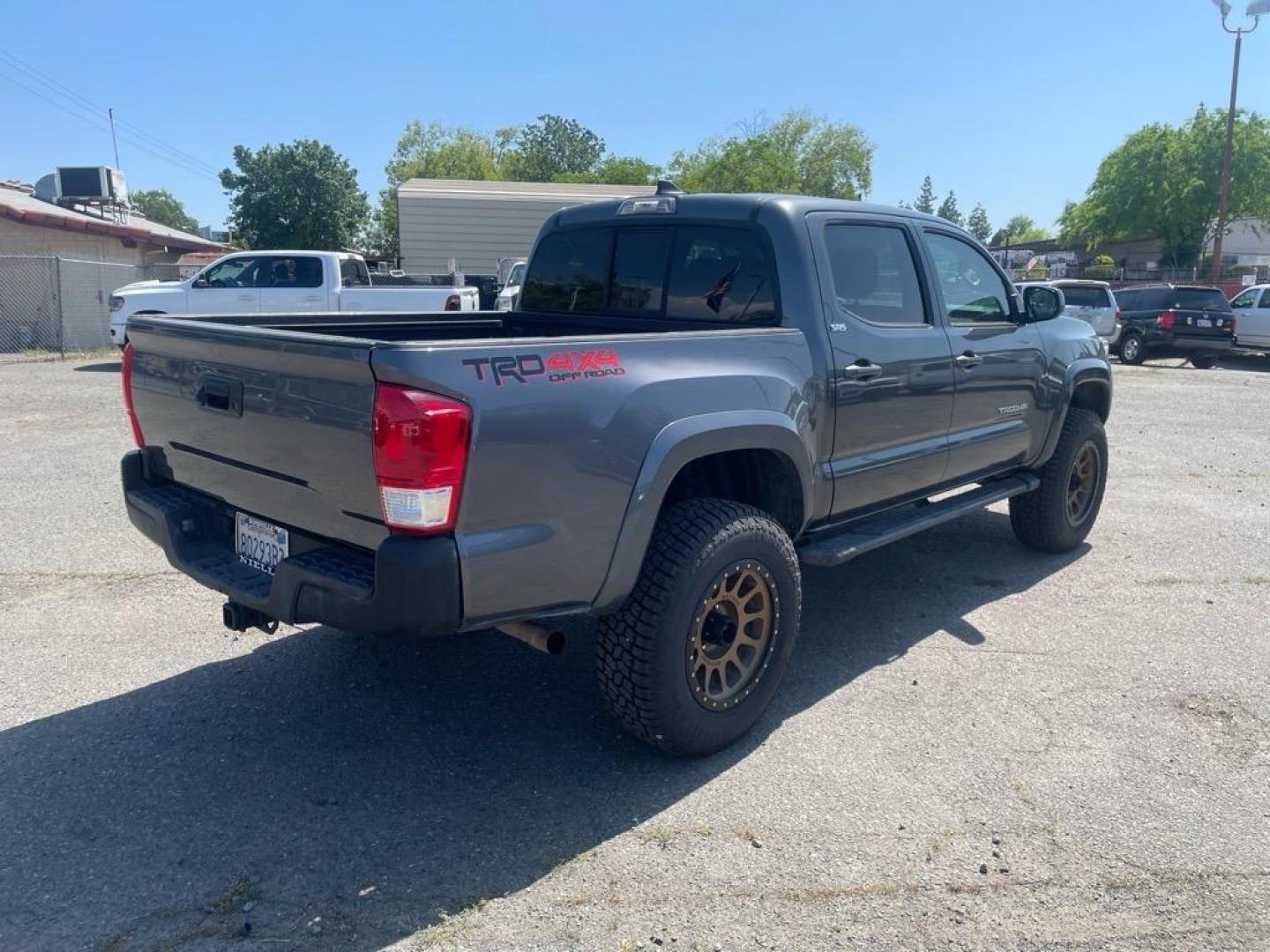 2017 Magnetic Gray Metallic Toyota Tacoma TRD Off-Road (3TMCZ5AN1HM) with an 3.5L 3.5L V6 278hp 265ft. lbs. Direct Injection engine, 6-Speed Shiftable Automatic transmission, located at 800 Riverside Ave, Roseville, CA, 95678, (916) 773-4549, 38.732265, -121.291039 - DOUBLE CAB TRD OFF ROAD 4X4 - Photo#4