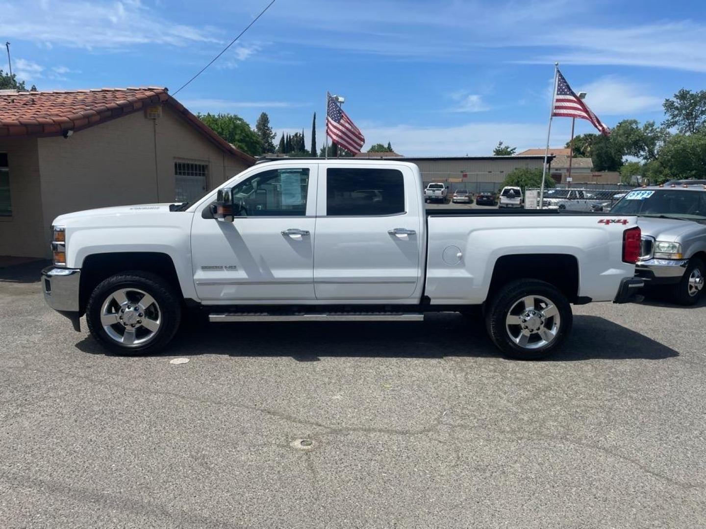 2016 Summit White Chevrolet Silverado 2500HD LTZ (1GC1KWE80GF) with an 6.6L Duramax 6.6L Diesel Turbo V8 397hp 765ft. lbs. Common Rail Direct Injection engine, Allison 1000 6-Speed Shiftable Automatic transmission, located at 800 Riverside Ave, Roseville, CA, 95678, (916) 773-4549, 38.732265, -121.291039 - DURAMAX DIESEL CREW CAB 4X4 LTZ LOW MILES MOON ROOF ALLISON TRANSMISSION ONE OWNER - Photo#5
