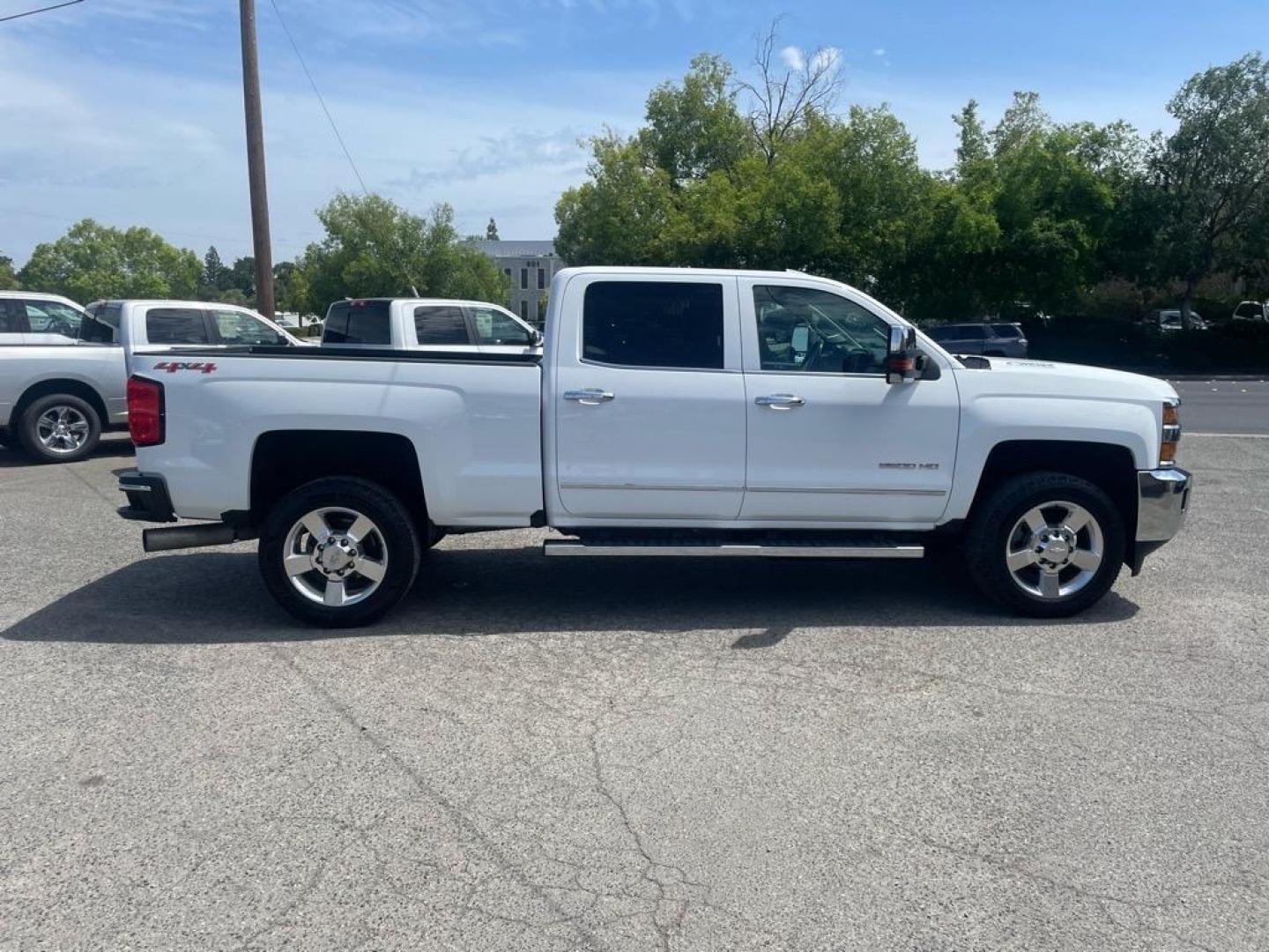 2016 Summit White Chevrolet Silverado 2500HD LTZ (1GC1KWE80GF) with an 6.6L Duramax 6.6L Diesel Turbo V8 397hp 765ft. lbs. Common Rail Direct Injection engine, Allison 1000 6-Speed Shiftable Automatic transmission, located at 800 Riverside Ave, Roseville, CA, 95678, (916) 773-4549, 38.732265, -121.291039 - DURAMAX DIESEL CREW CAB 4X4 LTZ LOW MILES MOON ROOF ALLISON TRANSMISSION ONE OWNER - Photo#6