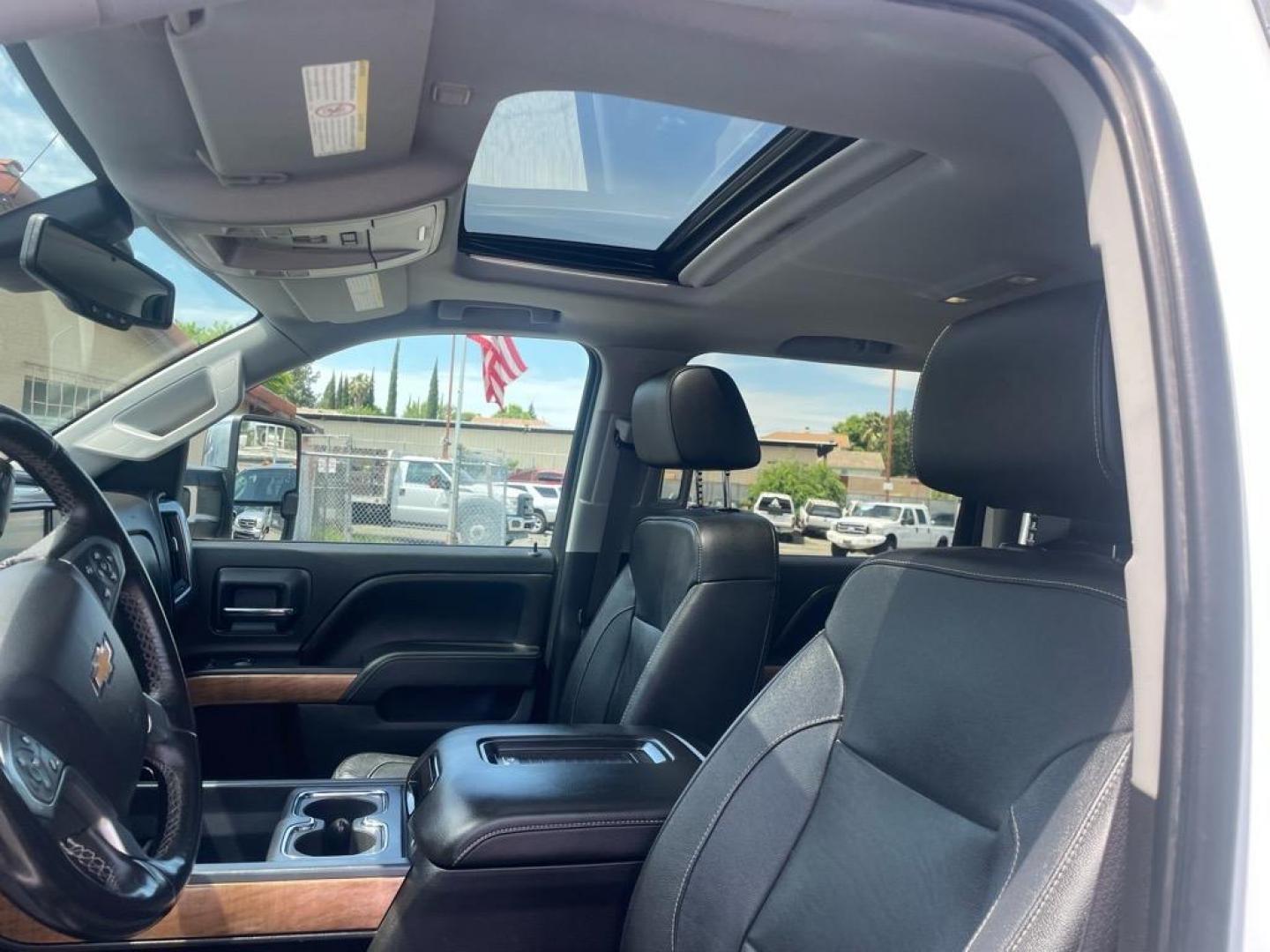 2016 Summit White Chevrolet Silverado 2500HD LTZ (1GC1KWE80GF) with an 6.6L Duramax 6.6L Diesel Turbo V8 397hp 765ft. lbs. Common Rail Direct Injection engine, Allison 1000 6-Speed Shiftable Automatic transmission, located at 800 Riverside Ave, Roseville, CA, 95678, (916) 773-4549, 38.732265, -121.291039 - DURAMAX DIESEL CREW CAB 4X4 LTZ LOW MILES MOON ROOF ALLISON TRANSMISSION ONE OWNER - Photo#11