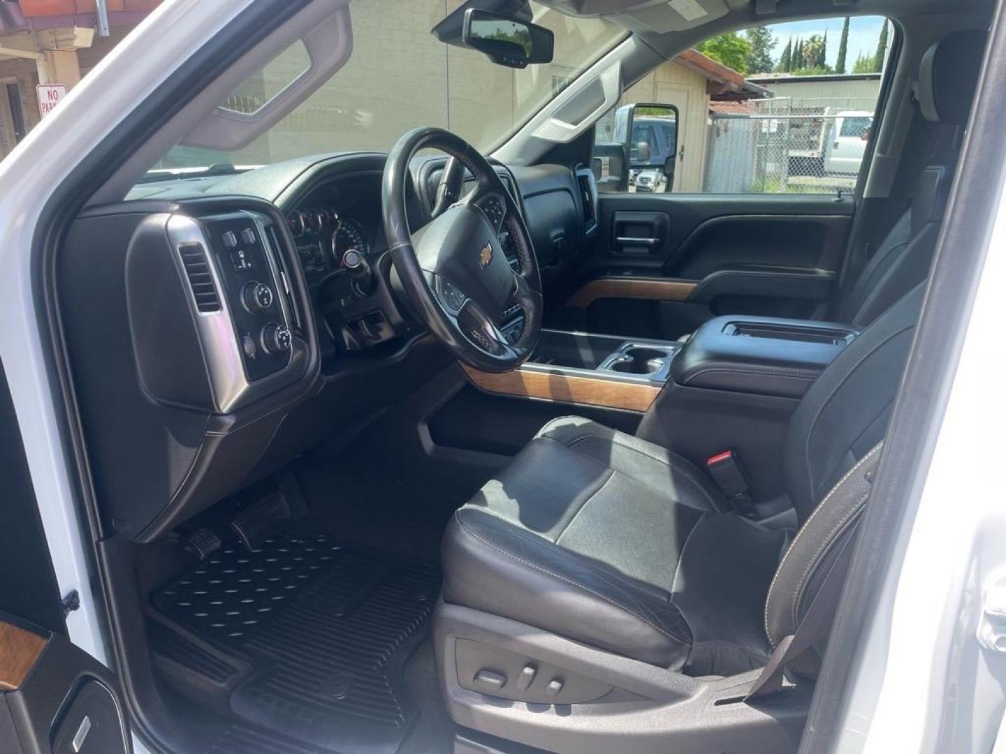 2016 Summit White Chevrolet Silverado 2500HD LTZ (1GC1KWE80GF) with an 6.6L Duramax 6.6L Diesel Turbo V8 397hp 765ft. lbs. Common Rail Direct Injection engine, Allison 1000 6-Speed Shiftable Automatic transmission, located at 800 Riverside Ave, Roseville, CA, 95678, (916) 773-4549, 38.732265, -121.291039 - DURAMAX DIESEL CREW CAB 4X4 LTZ LOW MILES MOON ROOF ALLISON TRANSMISSION ONE OWNER - Photo#12