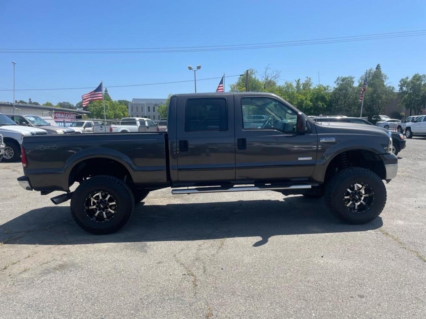 2006 Brown Ford F-250 Super Duty Lariat (1FTSW21P16E) with an 6.0L Power Stroke 6.0L Diesel Turbo V8 325hp 560ft. lbs. Direct Injection engine, 5-Speed Automatic transmission, located at 800 Riverside Ave, Roseville, CA, 95678, (916) 773-4549, 38.732265, -121.291039 - DIESEL CREW CAB 4X4 LARIAT LIFTED HEADSTUDS BULLET PROOF EGR COOLER SERVICE RECORDS - Photo#5