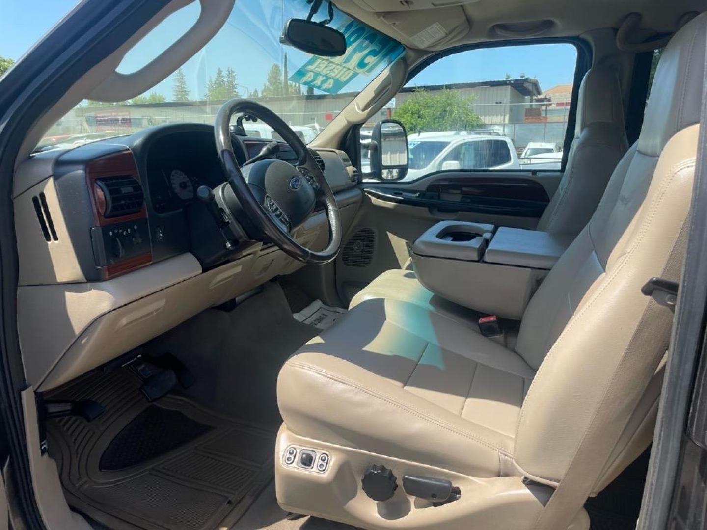 2006 Brown Ford F-250 Super Duty Lariat (1FTSW21P16E) with an 6.0L Power Stroke 6.0L Diesel Turbo V8 325hp 560ft. lbs. Direct Injection engine, 5-Speed Automatic transmission, located at 800 Riverside Ave, Roseville, CA, 95678, (916) 773-4549, 38.732265, -121.291039 - DIESEL CREW CAB 4X4 LARIAT LIFTED HEADSTUDS BULLET PROOF EGR COOLER SERVICE RECORDS - Photo#8