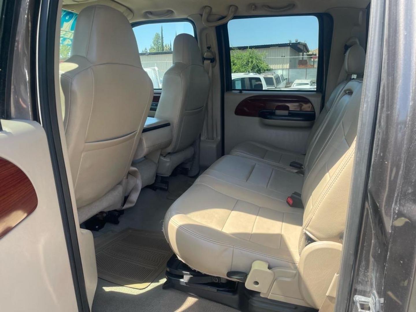 2006 Brown Ford F-250 Super Duty Lariat (1FTSW21P16E) with an 6.0L Power Stroke 6.0L Diesel Turbo V8 325hp 560ft. lbs. Direct Injection engine, 5-Speed Automatic transmission, located at 800 Riverside Ave, Roseville, CA, 95678, (916) 773-4549, 38.732265, -121.291039 - DIESEL CREW CAB 4X4 LARIAT LIFTED HEADSTUDS BULLET PROOF EGR COOLER SERVICE RECORDS - Photo#9