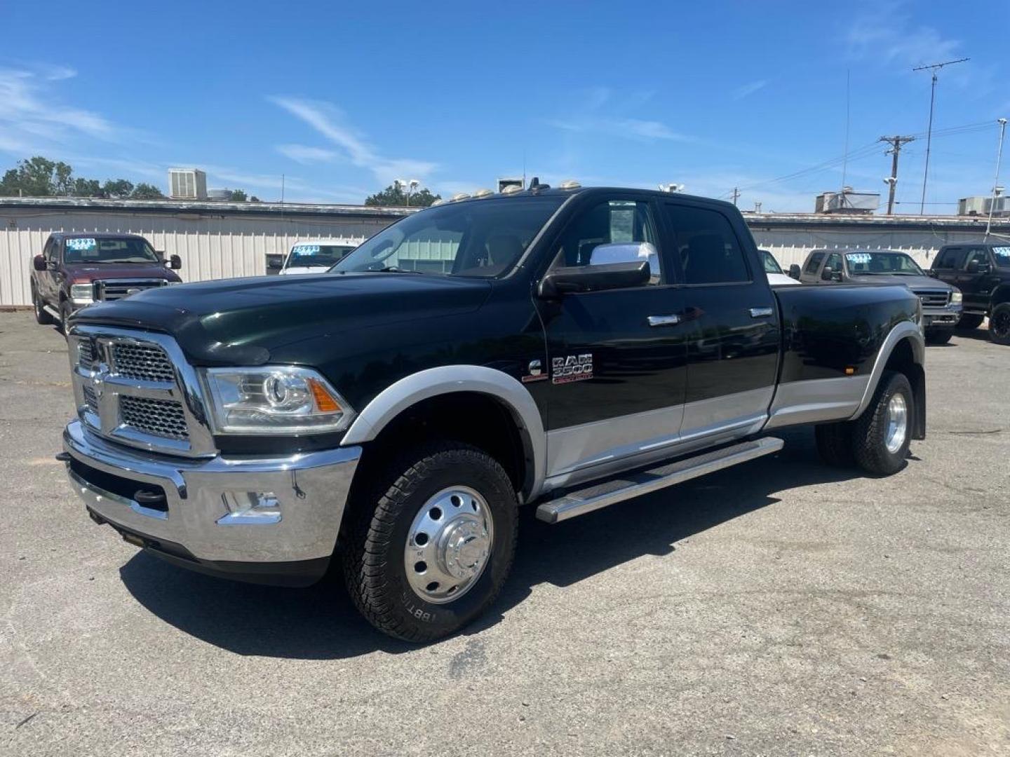 2015 Black Forest Green Pearl Coat/Bright Silver Metall RAM 3500 Laramie (3C63RRJL4FG) with an 6.7L Cummins 6.7L Diesel Turbo I6 350hp 660ft. lbs. Common Rail Direct Injection engine, Automatic transmission, located at 800 Riverside Ave, Roseville, CA, 95678, (916) 773-4549, 38.732265, -121.291039 - CUMMINS DIESEL CREW CAB DUALLY 4X4 LARAMIE - Photo#0