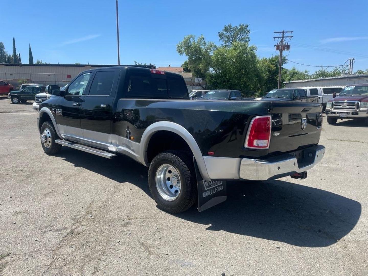 2015 Black Forest Green Pearl Coat/Bright Silver Metall RAM 3500 Laramie (3C63RRJL4FG) with an 6.7L Cummins 6.7L Diesel Turbo I6 350hp 660ft. lbs. Common Rail Direct Injection engine, Automatic transmission, located at 800 Riverside Ave, Roseville, CA, 95678, (916) 773-4549, 38.732265, -121.291039 - CUMMINS DIESEL CREW CAB DUALLY 4X4 LARAMIE - Photo#3