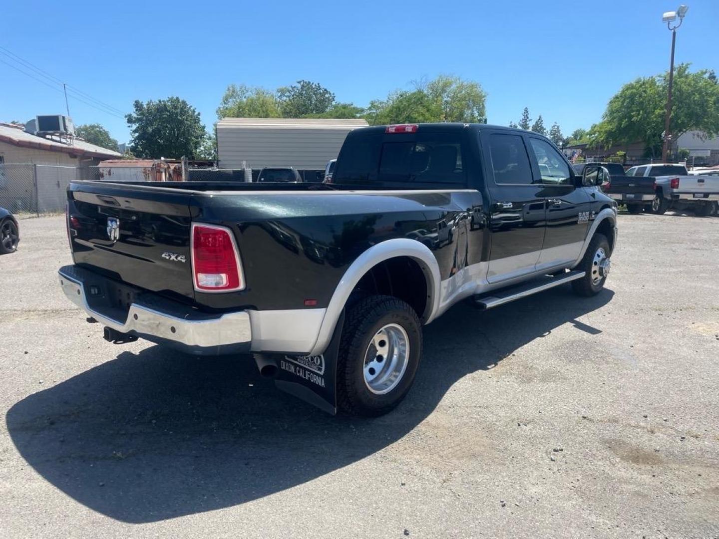 2015 Black Forest Green Pearl Coat/Bright Silver Metall RAM 3500 Laramie (3C63RRJL4FG) with an 6.7L Cummins 6.7L Diesel Turbo I6 350hp 660ft. lbs. Common Rail Direct Injection engine, Automatic transmission, located at 800 Riverside Ave, Roseville, CA, 95678, (916) 773-4549, 38.732265, -121.291039 - CUMMINS DIESEL CREW CAB DUALLY 4X4 LARAMIE - Photo#4