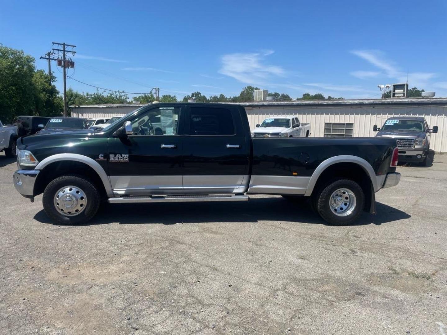 2015 Black Forest Green Pearl Coat/Bright Silver Metall RAM 3500 Laramie (3C63RRJL4FG) with an 6.7L Cummins 6.7L Diesel Turbo I6 350hp 660ft. lbs. Common Rail Direct Injection engine, Automatic transmission, located at 800 Riverside Ave, Roseville, CA, 95678, (916) 773-4549, 38.732265, -121.291039 - CUMMINS DIESEL CREW CAB DUALLY 4X4 LARAMIE - Photo#5
