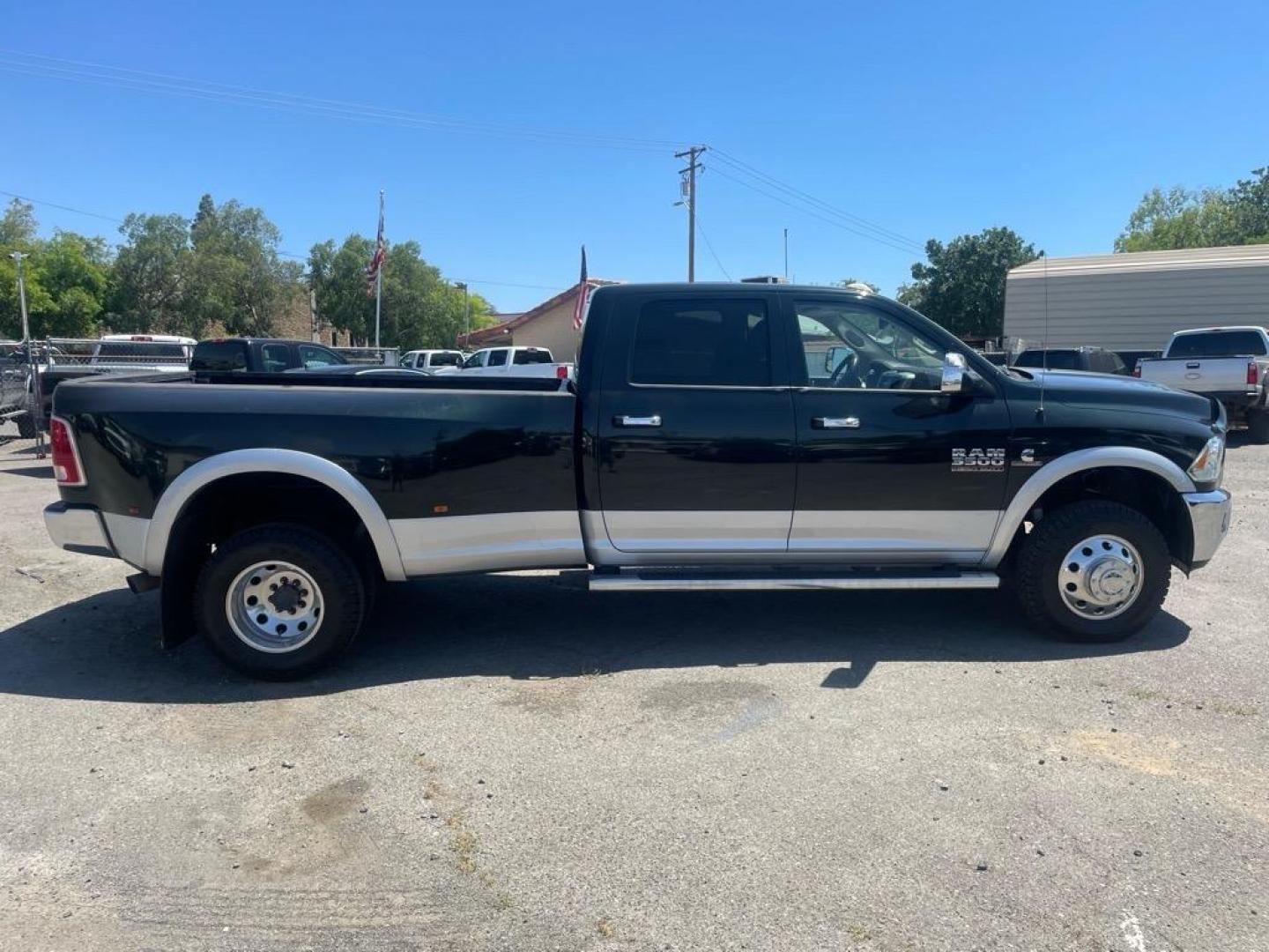 2015 Black Forest Green Pearl Coat/Bright Silver Metall RAM 3500 Laramie (3C63RRJL4FG) with an 6.7L Cummins 6.7L Diesel Turbo I6 350hp 660ft. lbs. Common Rail Direct Injection engine, Automatic transmission, located at 800 Riverside Ave, Roseville, CA, 95678, (916) 773-4549, 38.732265, -121.291039 - CUMMINS DIESEL CREW CAB DUALLY 4X4 LARAMIE - Photo#6