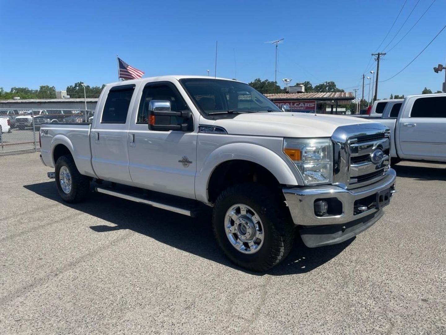 2013 Oxford White Ford F-250 Super Duty Lariat (1FT7W2BT4DE) with an 6.7L Power Stroke 6.7L Biodiesel Turbo V8 400hp 800ft. lbs. Common Rail Direct Injection engine, 6-Speed Shiftable Automatic transmission, located at 800 Riverside Ave, Roseville, CA, 95678, (916) 773-4549, 38.732265, -121.291039 - DIESEL CREW CAB 4X4 FX4 LARIAT MOON ROOF SERVICE RECORDS - Photo#1
