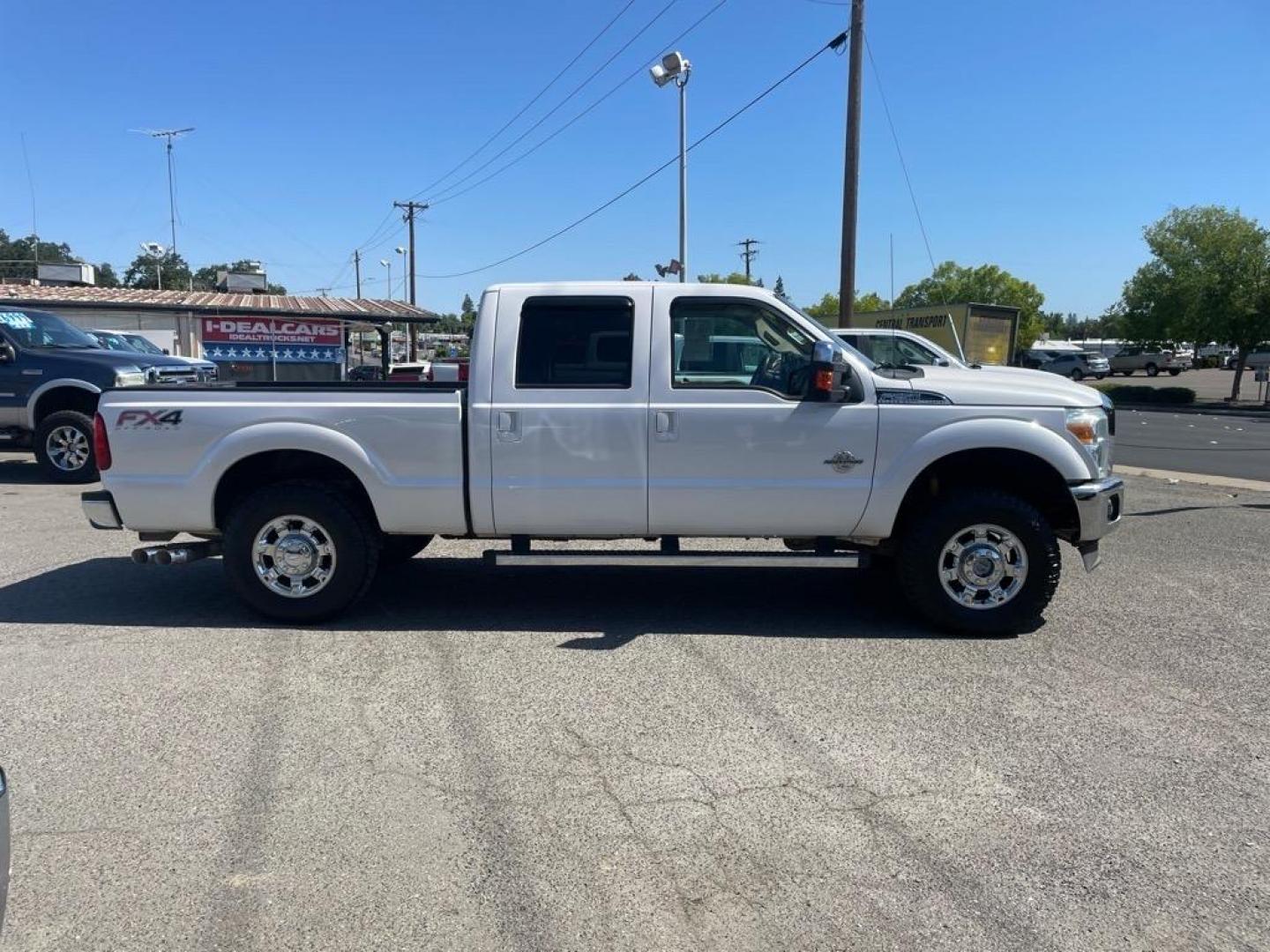 2013 Oxford White Ford F-250 Super Duty Lariat (1FT7W2BT4DE) with an 6.7L Power Stroke 6.7L Biodiesel Turbo V8 400hp 800ft. lbs. Common Rail Direct Injection engine, 6-Speed Shiftable Automatic transmission, located at 800 Riverside Ave, Roseville, CA, 95678, (916) 773-4549, 38.732265, -121.291039 - DIESEL CREW CAB 4X4 FX4 LARIAT MOON ROOF SERVICE RECORDS - Photo#5