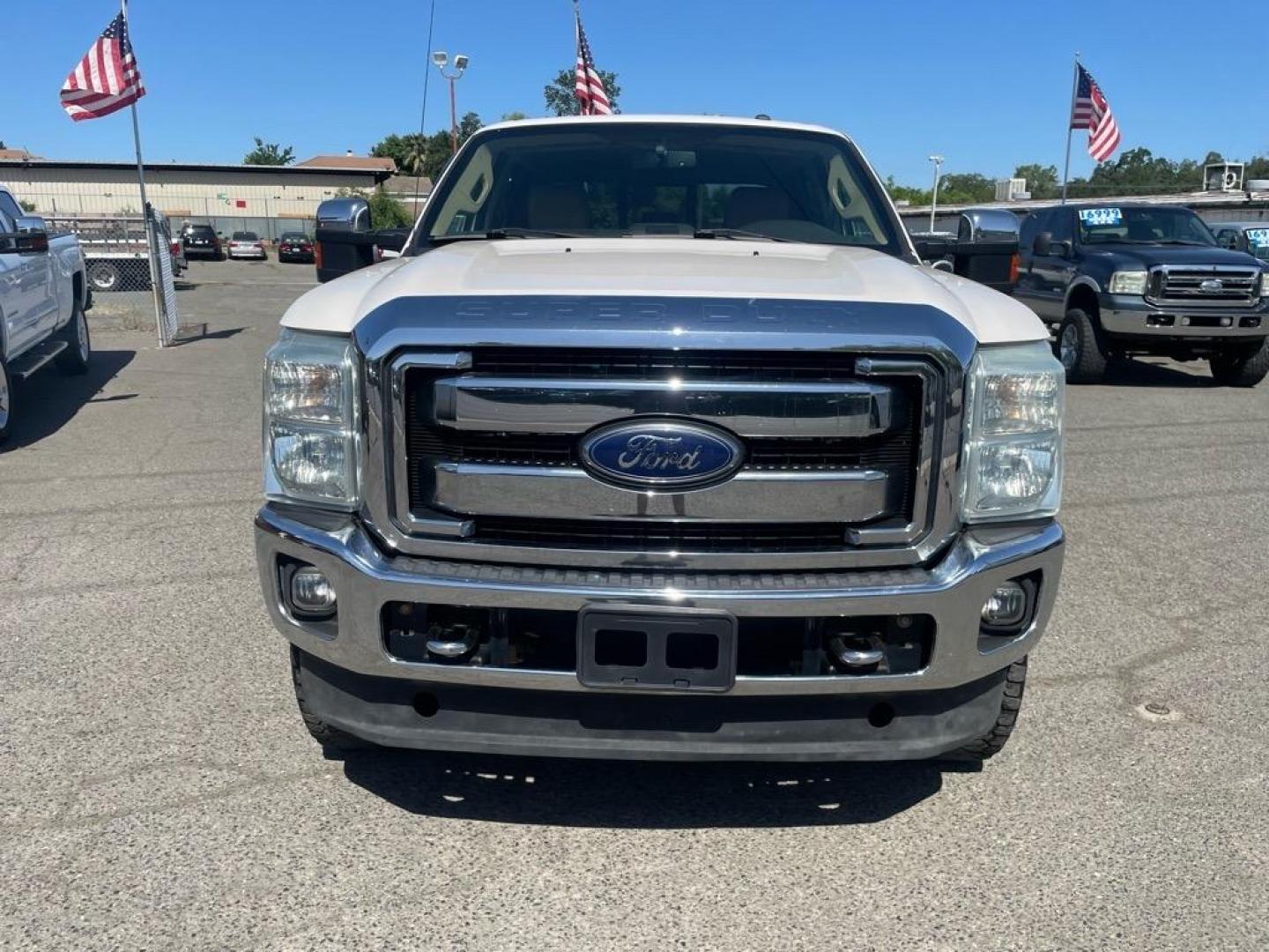 2013 Oxford White Ford F-250 Super Duty Lariat (1FT7W2BT4DE) with an 6.7L Power Stroke 6.7L Biodiesel Turbo V8 400hp 800ft. lbs. Common Rail Direct Injection engine, 6-Speed Shiftable Automatic transmission, located at 800 Riverside Ave, Roseville, CA, 95678, (916) 773-4549, 38.732265, -121.291039 - DIESEL CREW CAB 4X4 FX4 LARIAT MOON ROOF SERVICE RECORDS - Photo#6