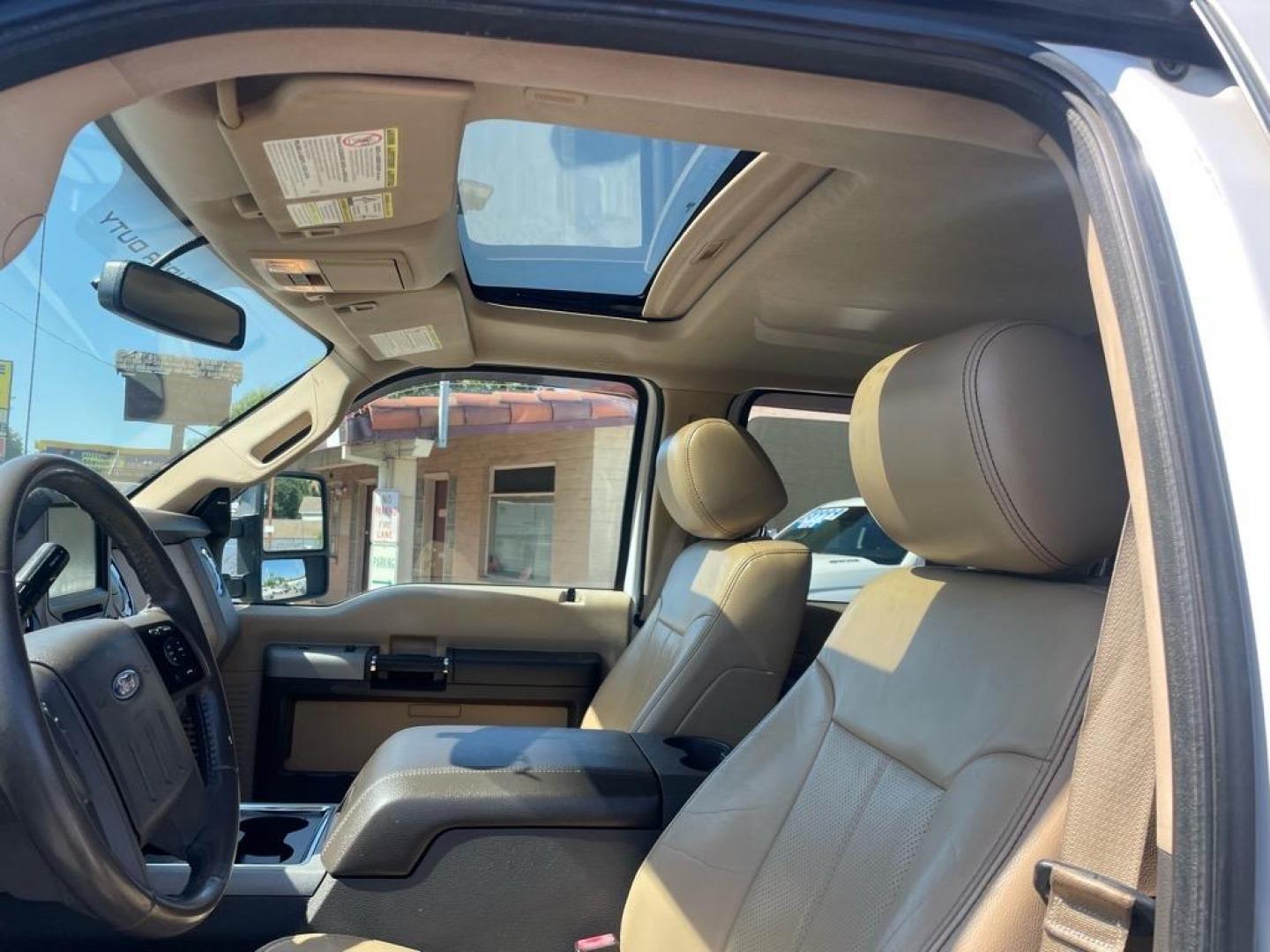 2013 Oxford White Ford F-250 Super Duty Lariat (1FT7W2BT4DE) with an 6.7L Power Stroke 6.7L Biodiesel Turbo V8 400hp 800ft. lbs. Common Rail Direct Injection engine, 6-Speed Shiftable Automatic transmission, located at 800 Riverside Ave, Roseville, CA, 95678, (916) 773-4549, 38.732265, -121.291039 - DIESEL CREW CAB 4X4 FX4 LARIAT MOON ROOF SERVICE RECORDS - Photo#9