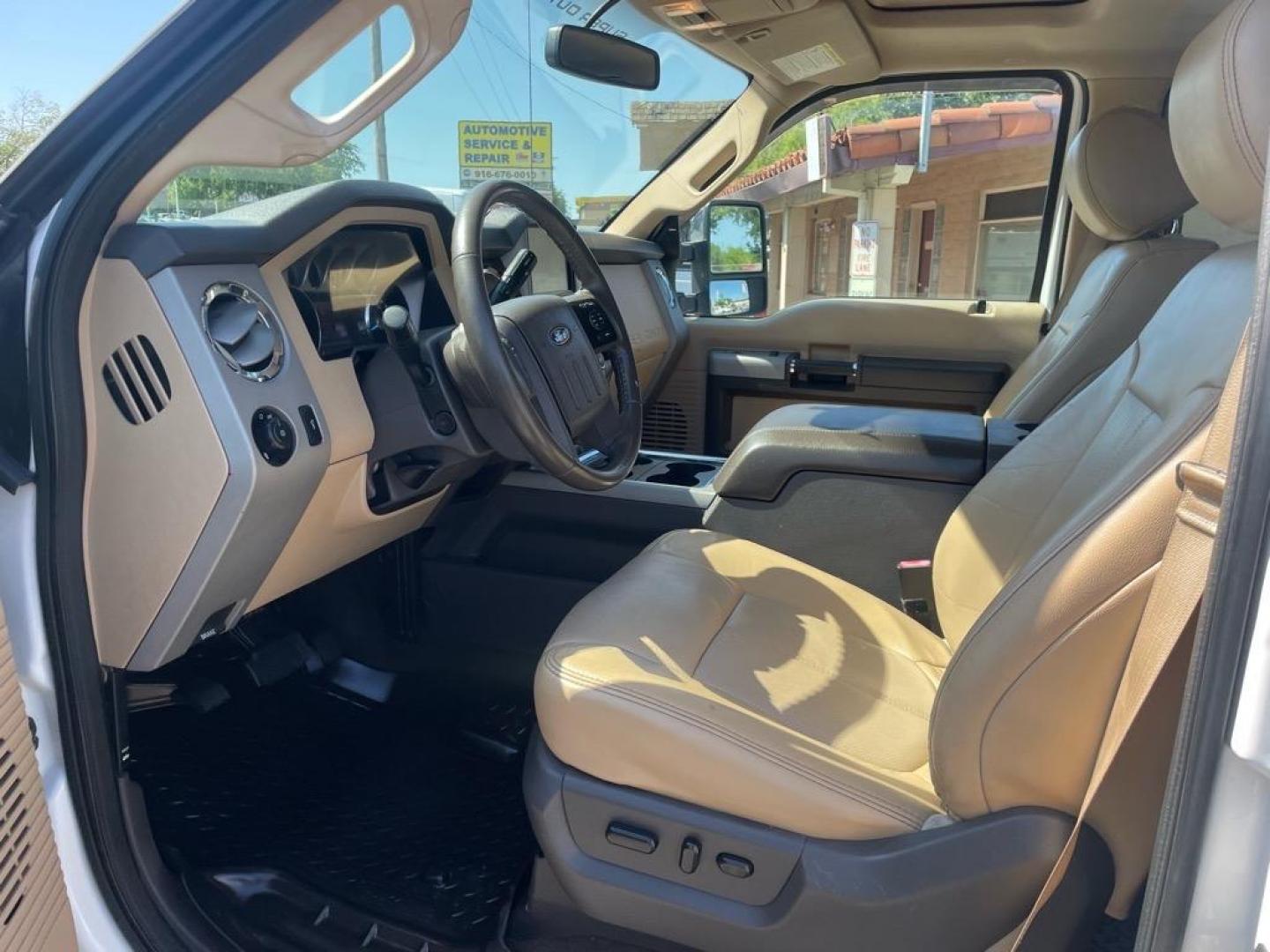 2013 Oxford White Ford F-250 Super Duty Lariat (1FT7W2BT4DE) with an 6.7L Power Stroke 6.7L Biodiesel Turbo V8 400hp 800ft. lbs. Common Rail Direct Injection engine, 6-Speed Shiftable Automatic transmission, located at 800 Riverside Ave, Roseville, CA, 95678, (916) 773-4549, 38.732265, -121.291039 - DIESEL CREW CAB 4X4 FX4 LARIAT MOON ROOF SERVICE RECORDS - Photo#10