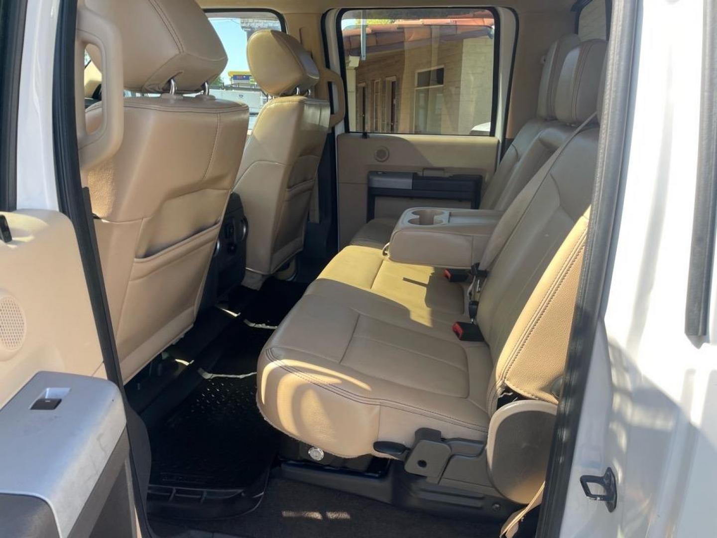 2013 Oxford White Ford F-250 Super Duty Lariat (1FT7W2BT4DE) with an 6.7L Power Stroke 6.7L Biodiesel Turbo V8 400hp 800ft. lbs. Common Rail Direct Injection engine, 6-Speed Shiftable Automatic transmission, located at 800 Riverside Ave, Roseville, CA, 95678, (916) 773-4549, 38.732265, -121.291039 - DIESEL CREW CAB 4X4 FX4 LARIAT MOON ROOF SERVICE RECORDS - Photo#11