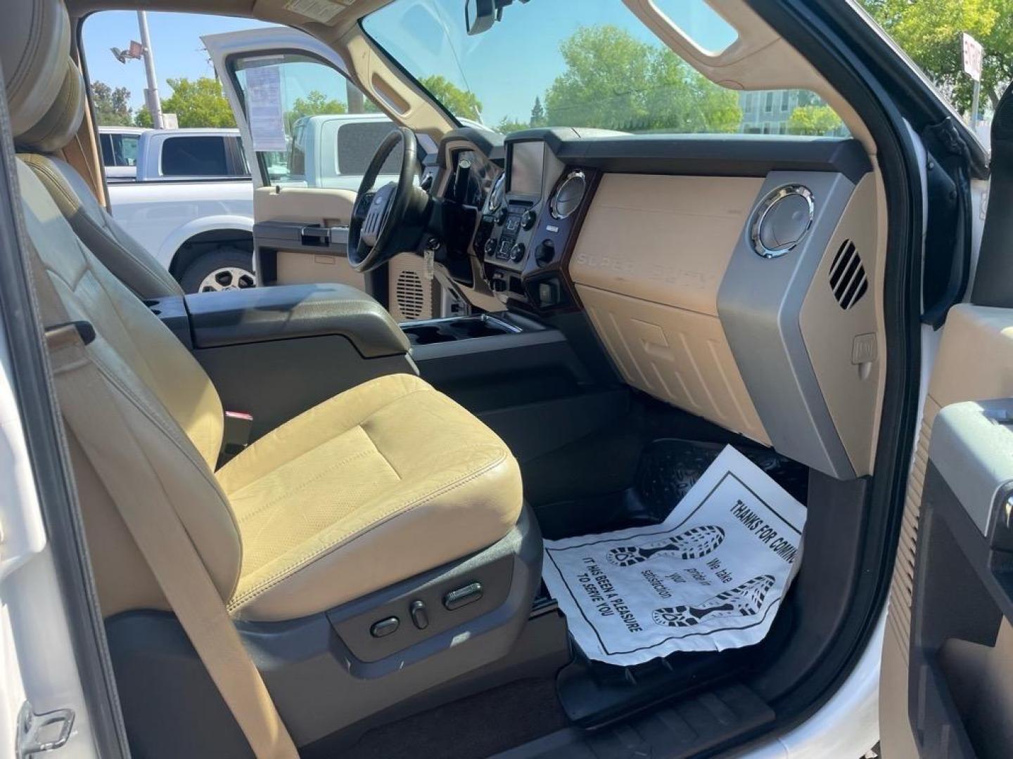 2013 Oxford White Ford F-250 Super Duty Lariat (1FT7W2BT4DE) with an 6.7L Power Stroke 6.7L Biodiesel Turbo V8 400hp 800ft. lbs. Common Rail Direct Injection engine, 6-Speed Shiftable Automatic transmission, located at 800 Riverside Ave, Roseville, CA, 95678, (916) 773-4549, 38.732265, -121.291039 - DIESEL CREW CAB 4X4 FX4 LARIAT MOON ROOF SERVICE RECORDS - Photo#12