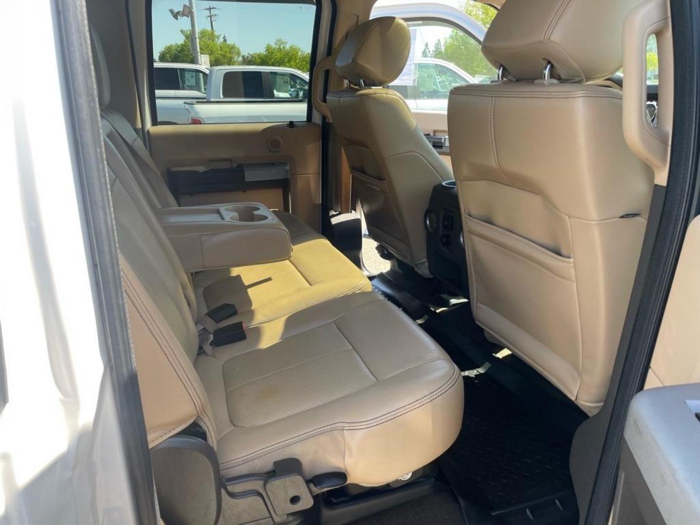 2013 Oxford White Ford F-250 Super Duty Lariat (1FT7W2BT4DE) with an 6.7L Power Stroke 6.7L Biodiesel Turbo V8 400hp 800ft. lbs. Common Rail Direct Injection engine, 6-Speed Shiftable Automatic transmission, located at 800 Riverside Ave, Roseville, CA, 95678, (916) 773-4549, 38.732265, -121.291039 - DIESEL CREW CAB 4X4 FX4 LARIAT MOON ROOF SERVICE RECORDS - Photo#13