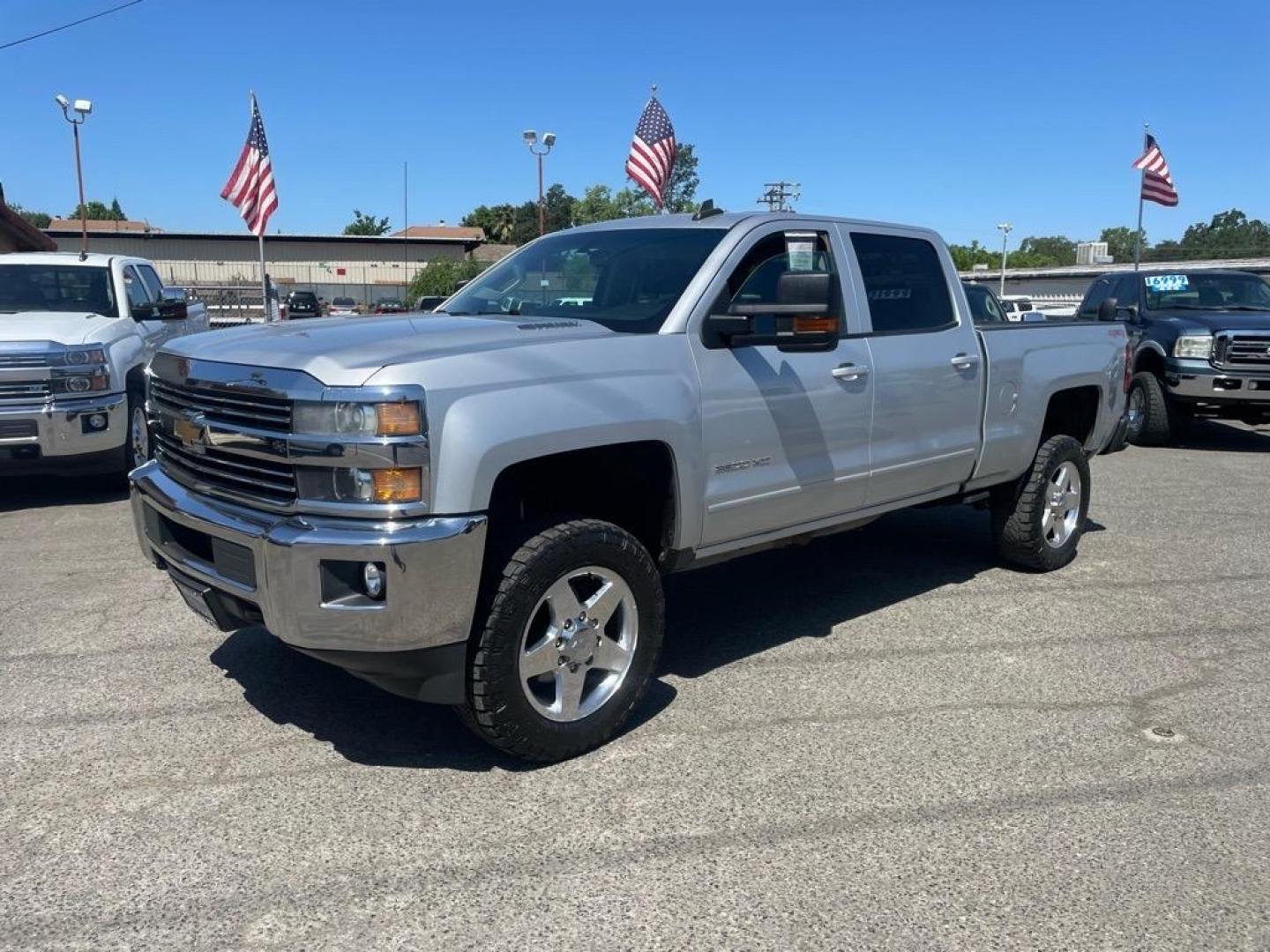 2015 Silver Ice Metallic Chevrolet Silverado 2500HD LT (1GC1KVE87FF) with an 6.6L Duramax 6.6L Diesel Turbo V8 397hp 765ft. lbs. Common Rail Direct Injection engine, Allison 1000 6-Speed Shiftable Automatic transmission, located at 800 Riverside Ave, Roseville, CA, 95678, (916) 773-4549, 38.732265, -121.291039 - DURAMAX DIESEL CREW CAB 4X4 LT ALLISON TRANSMISSION ONE OWNER CLEAN CARFAX - Photo#0