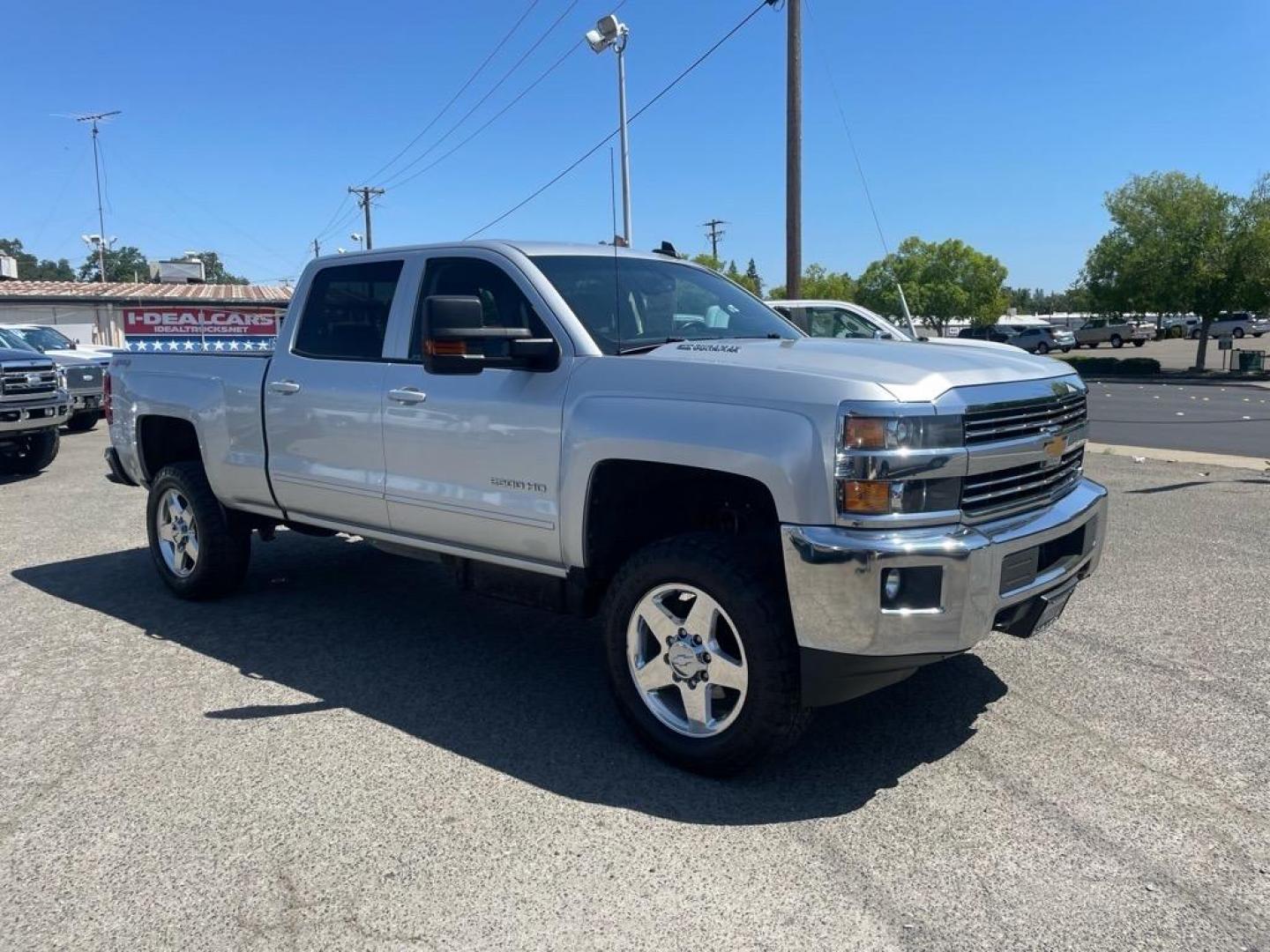 2015 Silver Ice Metallic Chevrolet Silverado 2500HD LT (1GC1KVE87FF) with an 6.6L Duramax 6.6L Diesel Turbo V8 397hp 765ft. lbs. Common Rail Direct Injection engine, Allison 1000 6-Speed Shiftable Automatic transmission, located at 800 Riverside Ave, Roseville, CA, 95678, (916) 773-4549, 38.732265, -121.291039 - DURAMAX DIESEL CREW CAB 4X4 LT ALLISON TRANSMISSION ONE OWNER CLEAN CARFAX - Photo#1