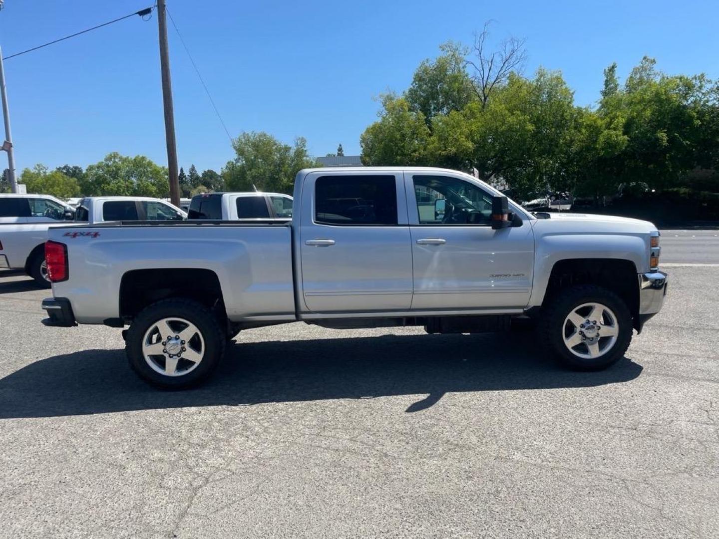 2015 Silver Ice Metallic Chevrolet Silverado 2500HD LT (1GC1KVE87FF) with an 6.6L Duramax 6.6L Diesel Turbo V8 397hp 765ft. lbs. Common Rail Direct Injection engine, Allison 1000 6-Speed Shiftable Automatic transmission, located at 800 Riverside Ave, Roseville, CA, 95678, (916) 773-4549, 38.732265, -121.291039 - DURAMAX DIESEL CREW CAB 4X4 LT ALLISON TRANSMISSION ONE OWNER CLEAN CARFAX - Photo#6