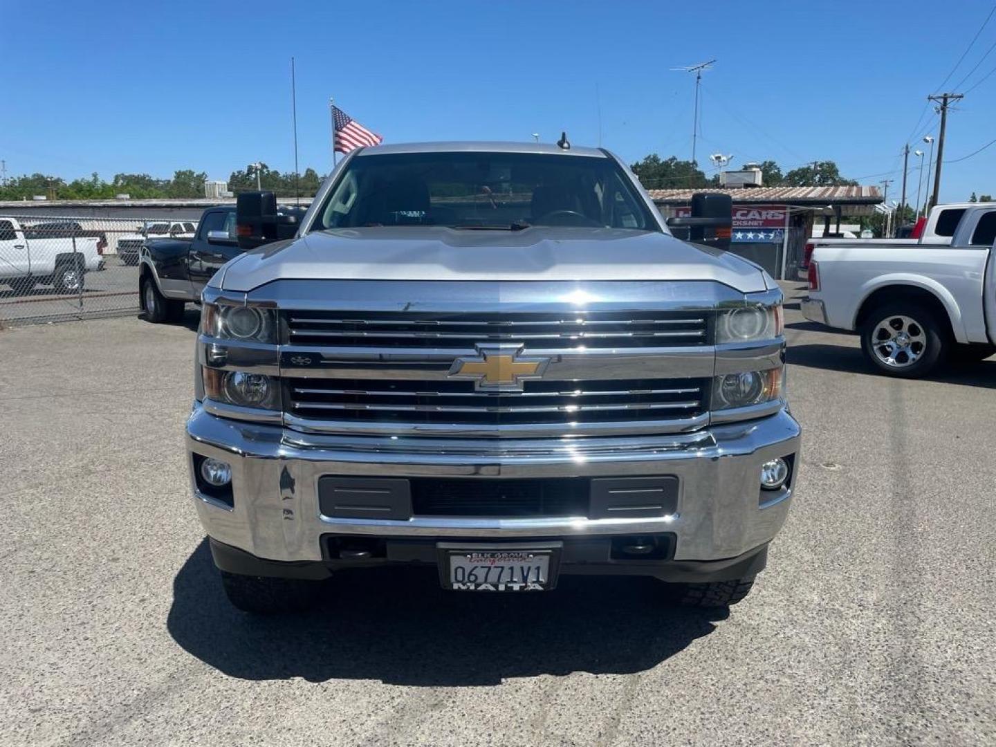2015 Silver Ice Metallic Chevrolet Silverado 2500HD LT (1GC1KVE87FF) with an 6.6L Duramax 6.6L Diesel Turbo V8 397hp 765ft. lbs. Common Rail Direct Injection engine, Allison 1000 6-Speed Shiftable Automatic transmission, located at 800 Riverside Ave, Roseville, CA, 95678, (916) 773-4549, 38.732265, -121.291039 - DURAMAX DIESEL CREW CAB 4X4 LT ALLISON TRANSMISSION ONE OWNER CLEAN CARFAX - Photo#7