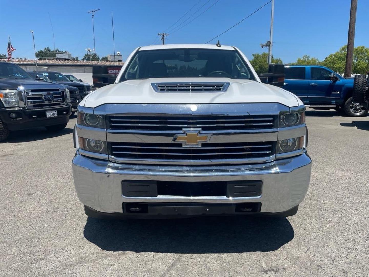 2017 Summit White Chevrolet Silverado 2500HD Work Truck (1GC1KUEYXHF) with an 6.6L Duramax 6.6L Biodiesel Turbo V8 445hp 910ft. lbs. Common Rail Direct Injection engine, Allison 1000 6-Speed Shiftable Automatic transmission, located at 800 Riverside Ave, Roseville, CA, 95678, (916) 773-4549, 38.732265, -121.291039 - Photo#7
