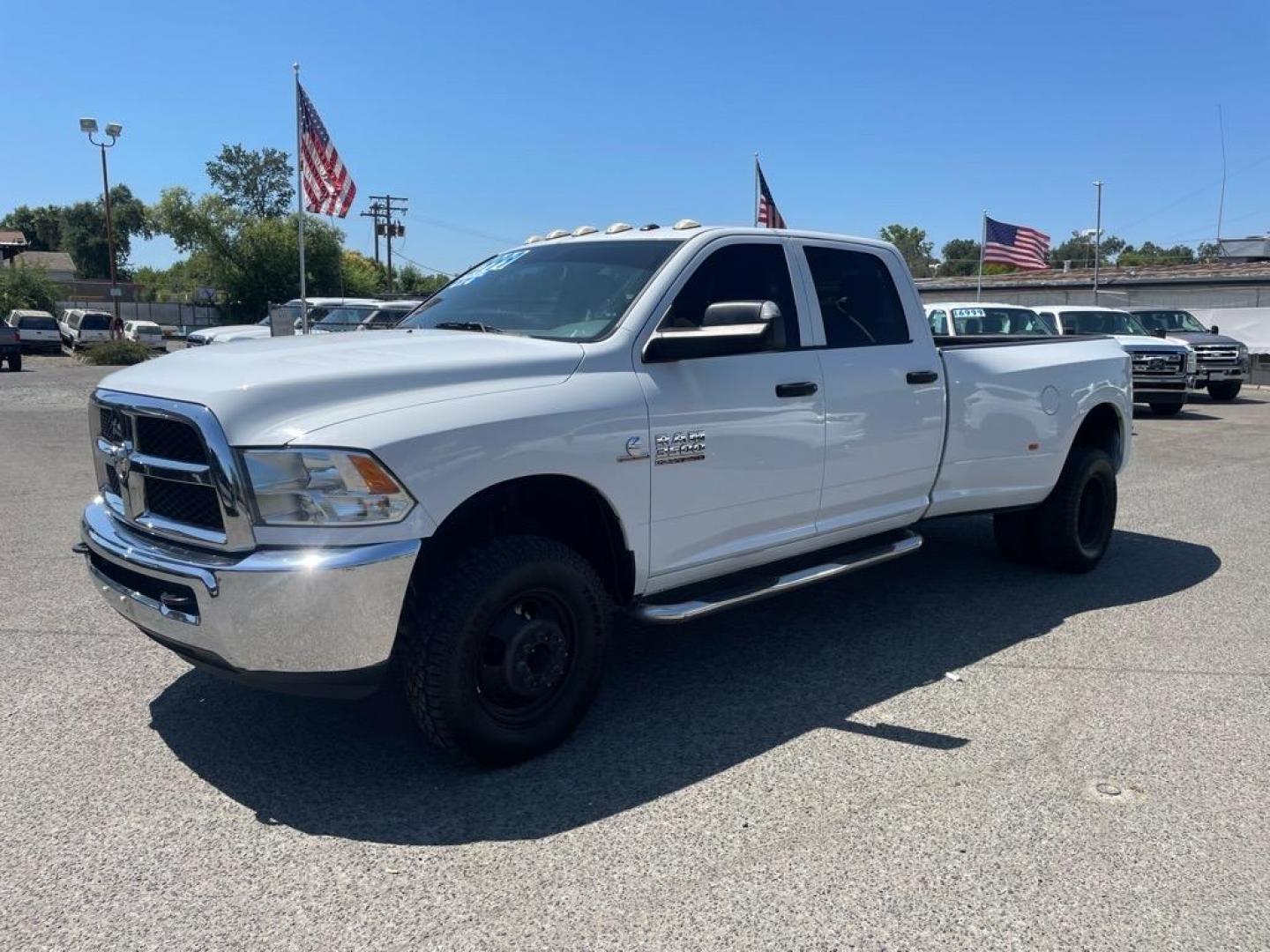 2017 Bright White Clear Coat RAM 3500 Tradesman (3C63RRGL9HG) with an 6.7L Cummins 6.7L Diesel Turbo I6 350hp 660ft. lbs. Common Rail Direct Injection engine, Automatic transmission, located at 800 Riverside Ave, Roseville, CA, 95678, (916) 773-4549, 38.732265, -121.291039 - Photo#0
