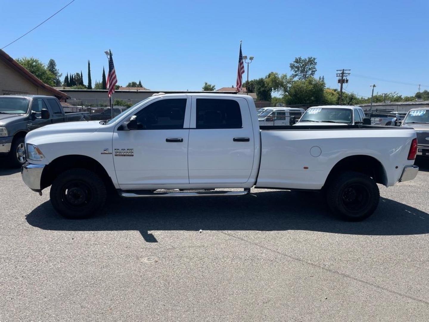2017 Bright White Clear Coat RAM 3500 Tradesman (3C63RRGL9HG) with an 6.7L Cummins 6.7L Diesel Turbo I6 350hp 660ft. lbs. Common Rail Direct Injection engine, Automatic transmission, located at 800 Riverside Ave, Roseville, CA, 95678, (916) 773-4549, 38.732265, -121.291039 - Photo#4