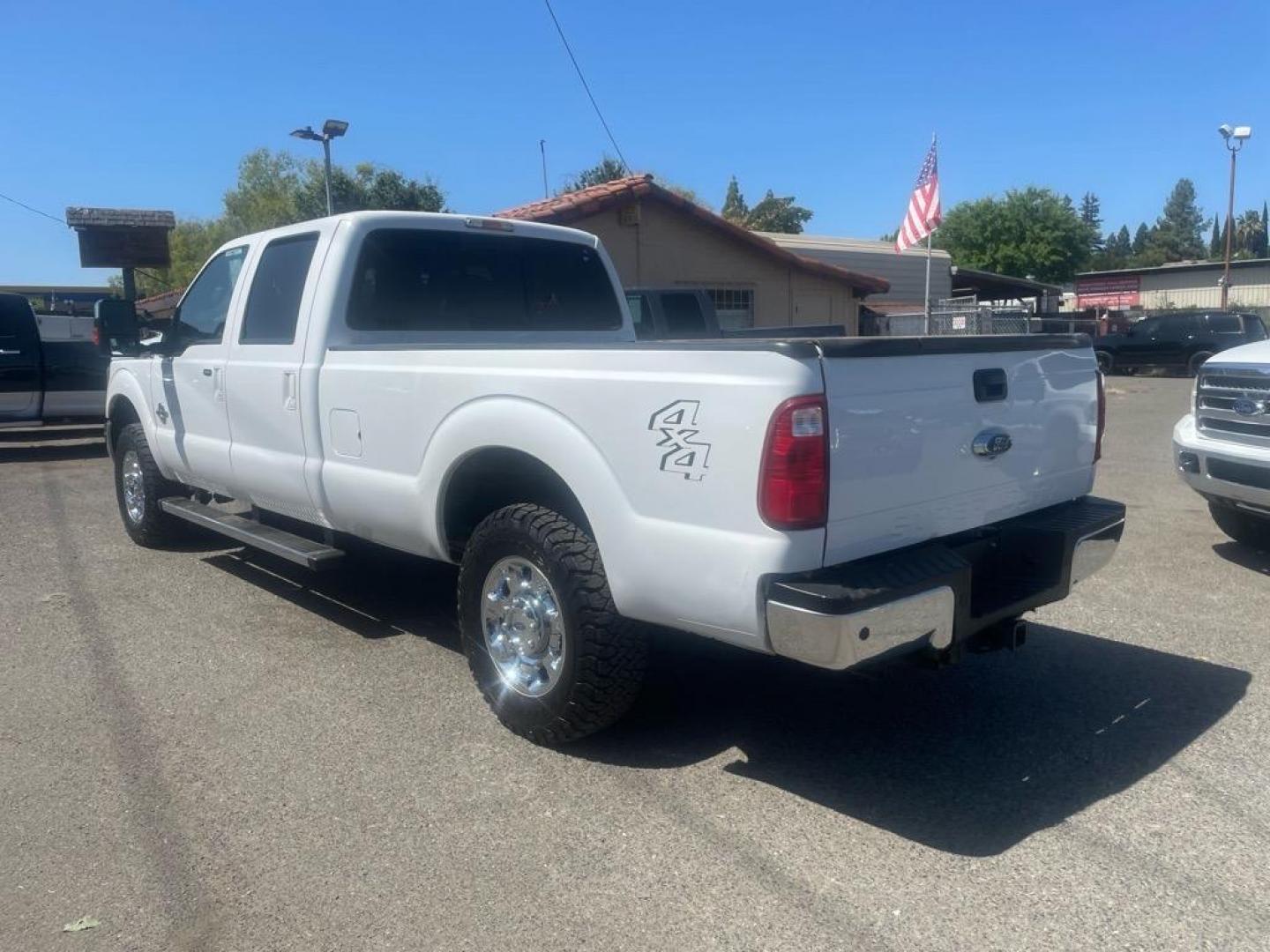 2016 Oxford White Ford F-250 Super Duty Lariat (1FT7W2BT4GE) with an 6.7L Power Stroke 6.7L Biodiesel Turbo V8 440hp 860ft. lbs. Common Rail Direct Injection engine, 6-Speed Shiftable Automatic transmission, located at 800 Riverside Ave, Roseville, CA, 95678, (916) 773-4549, 38.732265, -121.291039 - DIESEL CREW CAB 4X4 LARIAT MOON ROOF ONE OWNER SERVICE RECORDS ON CLEAN CARFAX - Photo#2