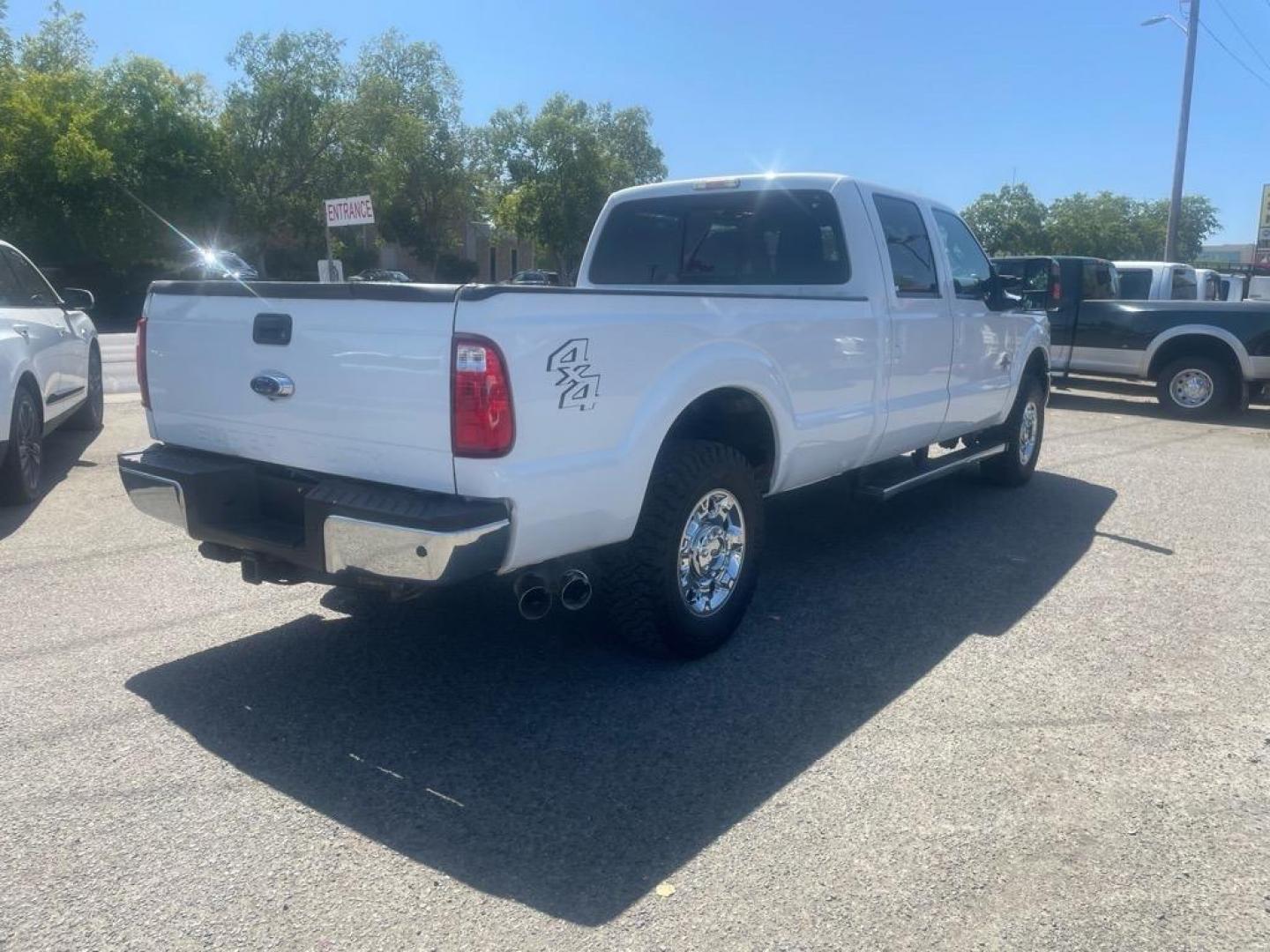 2016 Oxford White Ford F-250 Super Duty Lariat (1FT7W2BT4GE) with an 6.7L Power Stroke 6.7L Biodiesel Turbo V8 440hp 860ft. lbs. Common Rail Direct Injection engine, 6-Speed Shiftable Automatic transmission, located at 800 Riverside Ave, Roseville, CA, 95678, (916) 773-4549, 38.732265, -121.291039 - DIESEL CREW CAB 4X4 LARIAT MOON ROOF ONE OWNER SERVICE RECORDS ON CLEAN CARFAX - Photo#3