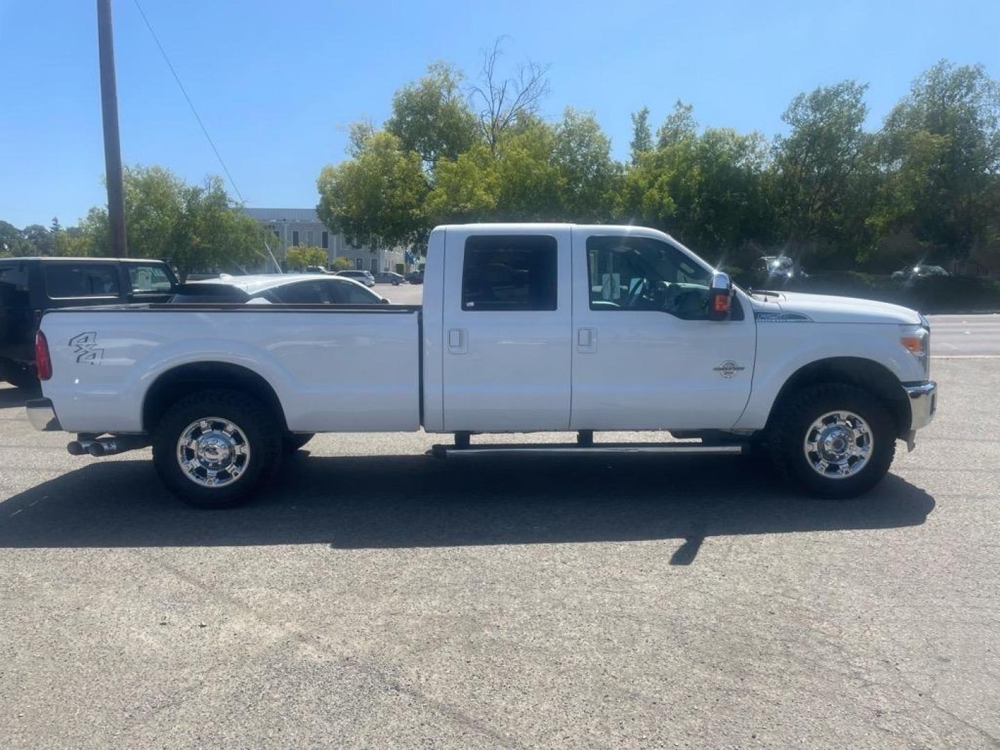 2016 Oxford White Ford F-250 Super Duty Lariat (1FT7W2BT4GE) with an 6.7L Power Stroke 6.7L Biodiesel Turbo V8 440hp 860ft. lbs. Common Rail Direct Injection engine, 6-Speed Shiftable Automatic transmission, located at 800 Riverside Ave, Roseville, CA, 95678, (916) 773-4549, 38.732265, -121.291039 - DIESEL CREW CAB 4X4 LARIAT MOON ROOF ONE OWNER SERVICE RECORDS ON CLEAN CARFAX - Photo#5