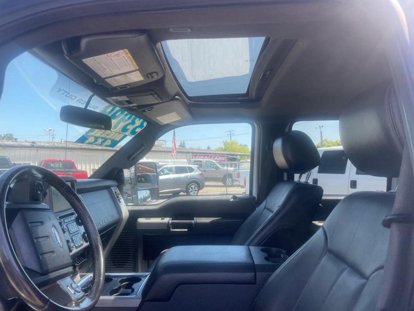 2016 Oxford White Ford F-250 Super Duty Lariat (1FT7W2BT4GE) with an 6.7L Power Stroke 6.7L Biodiesel Turbo V8 440hp 860ft. lbs. Common Rail Direct Injection engine, 6-Speed Shiftable Automatic transmission, located at 800 Riverside Ave, Roseville, CA, 95678, (916) 773-4549, 38.732265, -121.291039 - DIESEL CREW CAB 4X4 LARIAT MOON ROOF ONE OWNER SERVICE RECORDS ON CLEAN CARFAX - Photo#9