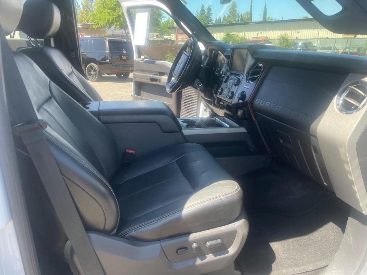 2016 Oxford White Ford F-250 Super Duty Lariat (1FT7W2BT4GE) with an 6.7L Power Stroke 6.7L Biodiesel Turbo V8 440hp 860ft. lbs. Common Rail Direct Injection engine, 6-Speed Shiftable Automatic transmission, located at 800 Riverside Ave, Roseville, CA, 95678, (916) 773-4549, 38.732265, -121.291039 - DIESEL CREW CAB 4X4 LARIAT MOON ROOF ONE OWNER SERVICE RECORDS ON CLEAN CARFAX - Photo#11