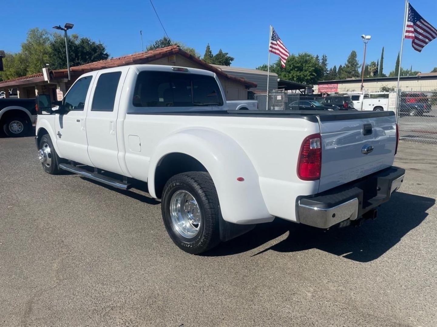 2014 Oxford White Ford F-350 Super Duty Lariat (1FT8W3CT8EE) with an 6.7L Power Stroke 6.7L Biodiesel Turbo V8 400hp 800ft. lbs. Common Rail Direct Injection engine, 6-Speed Shiftable Automatic transmission, located at 800 Riverside Ave, Roseville, CA, 95678, (916) 773-4549, 38.732265, -121.291039 - DIESEL CREW CAB DUALLY LARIAT SERVICE RECORDS ON CLEAN CARFAX - Photo#2