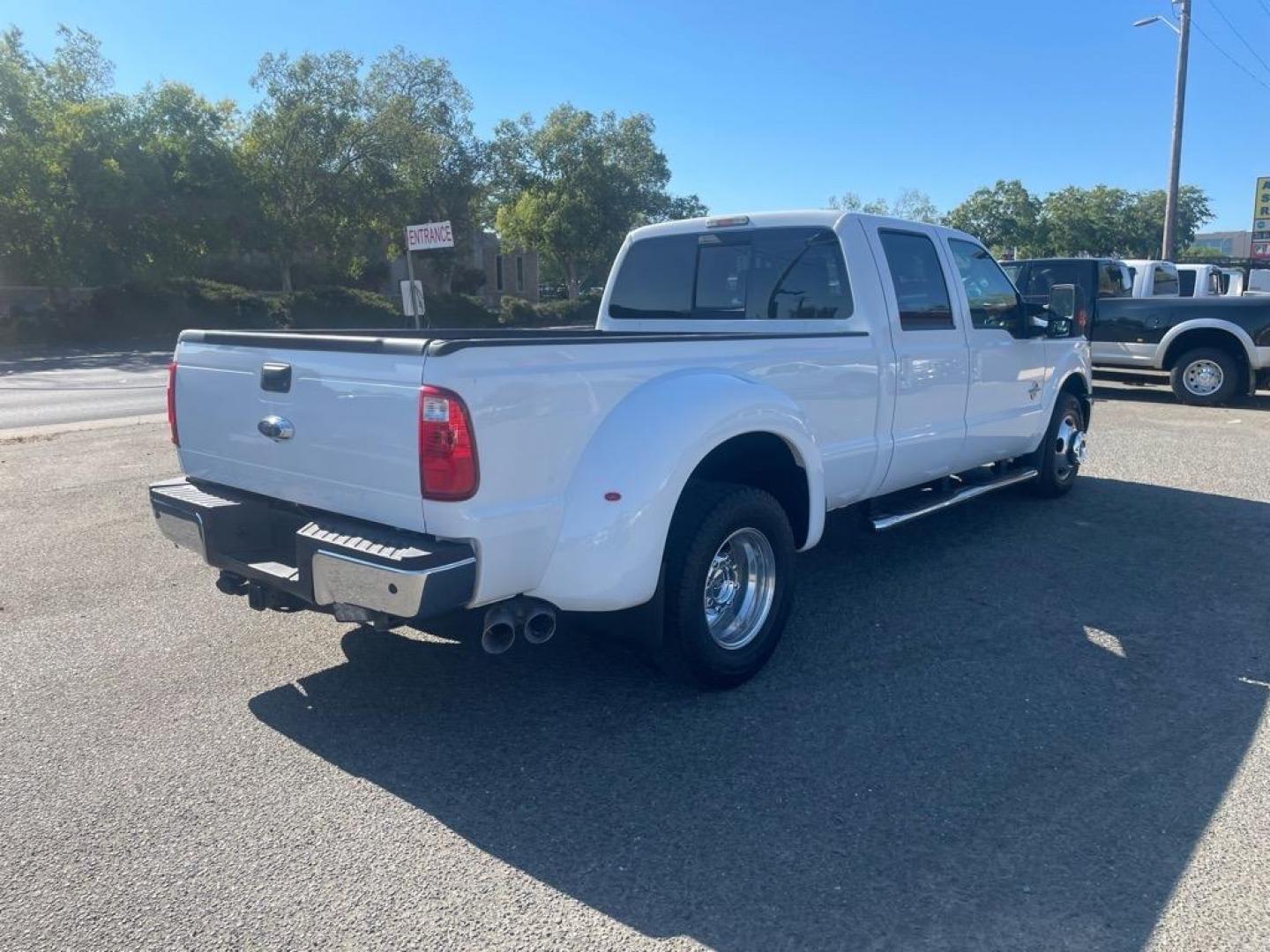 2014 Oxford White Ford F-350 Super Duty Lariat (1FT8W3CT8EE) with an 6.7L Power Stroke 6.7L Biodiesel Turbo V8 400hp 800ft. lbs. Common Rail Direct Injection engine, 6-Speed Shiftable Automatic transmission, located at 800 Riverside Ave, Roseville, CA, 95678, (916) 773-4549, 38.732265, -121.291039 - DIESEL CREW CAB DUALLY LARIAT SERVICE RECORDS ON CLEAN CARFAX - Photo#3