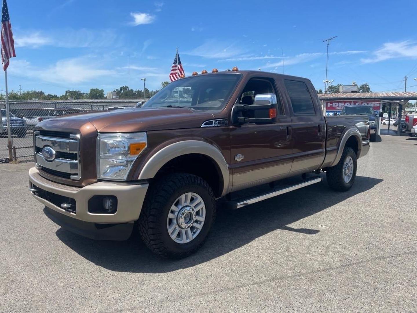 2011 Golden Bronze Metallic/Pale Adobe Metallic Ford F-250 Super Duty King Ranch (1FT7W2BTXBE) with an 6.7L Power Stroke 6.7L Biodiesel Turbo V8 400hp 800ft. lbs. Common Rail Direct Injection engine, 6-Speed Shiftable Automatic transmission, located at 800 Riverside Ave, Roseville, CA, 95678, (916) 773-4549, 38.732265, -121.291039 - DIESEL CREW CAB 4X4 FX4 KING RANCH SERVICE RECORDS ON CLEAN CARFAX - Photo#0