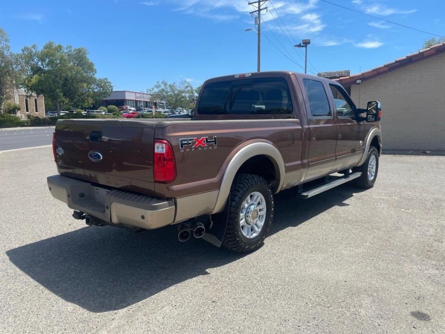 2011 Golden Bronze Metallic/Pale Adobe Metallic Ford F-250 Super Duty King Ranch (1FT7W2BTXBE) with an 6.7L Power Stroke 6.7L Biodiesel Turbo V8 400hp 800ft. lbs. Common Rail Direct Injection engine, 6-Speed Shiftable Automatic transmission, located at 800 Riverside Ave, Roseville, CA, 95678, (916) 773-4549, 38.732265, -121.291039 - DIESEL CREW CAB 4X4 FX4 KING RANCH SERVICE RECORDS ON CLEAN CARFAX - Photo#3