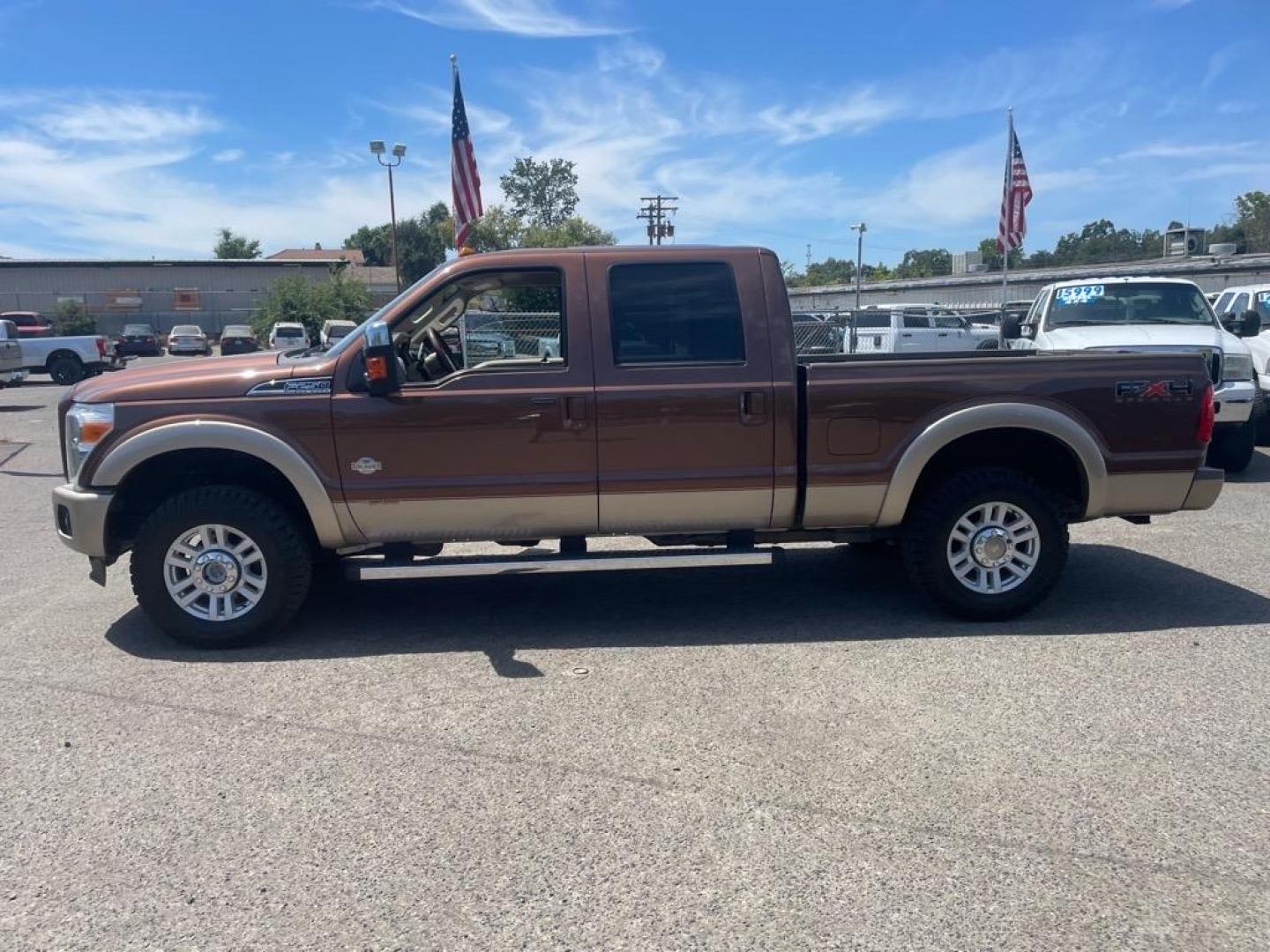 2011 Golden Bronze Metallic/Pale Adobe Metallic Ford F-250 Super Duty King Ranch (1FT7W2BTXBE) with an 6.7L Power Stroke 6.7L Biodiesel Turbo V8 400hp 800ft. lbs. Common Rail Direct Injection engine, 6-Speed Shiftable Automatic transmission, located at 800 Riverside Ave, Roseville, CA, 95678, (916) 773-4549, 38.732265, -121.291039 - DIESEL CREW CAB 4X4 FX4 KING RANCH SERVICE RECORDS ON CLEAN CARFAX - Photo#4