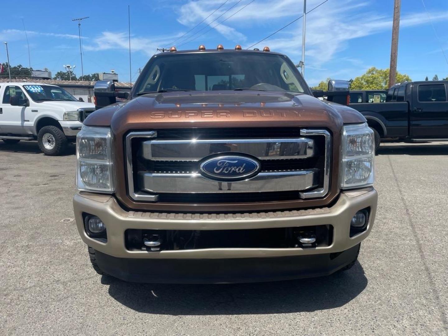 2011 Golden Bronze Metallic/Pale Adobe Metallic Ford F-250 Super Duty King Ranch (1FT7W2BTXBE) with an 6.7L Power Stroke 6.7L Biodiesel Turbo V8 400hp 800ft. lbs. Common Rail Direct Injection engine, 6-Speed Shiftable Automatic transmission, located at 800 Riverside Ave, Roseville, CA, 95678, (916) 773-4549, 38.732265, -121.291039 - DIESEL CREW CAB 4X4 FX4 KING RANCH SERVICE RECORDS ON CLEAN CARFAX - Photo#7