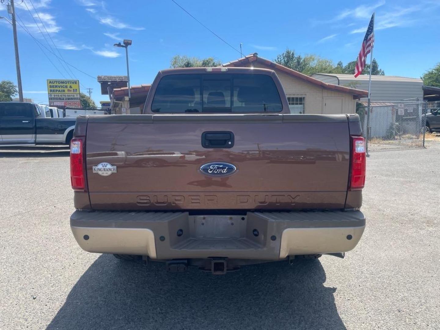 2011 Golden Bronze Metallic/Pale Adobe Metallic Ford F-250 Super Duty King Ranch (1FT7W2BTXBE) with an 6.7L Power Stroke 6.7L Biodiesel Turbo V8 400hp 800ft. lbs. Common Rail Direct Injection engine, 6-Speed Shiftable Automatic transmission, located at 800 Riverside Ave, Roseville, CA, 95678, (916) 773-4549, 38.732265, -121.291039 - DIESEL CREW CAB 4X4 FX4 KING RANCH SERVICE RECORDS ON CLEAN CARFAX - Photo#8