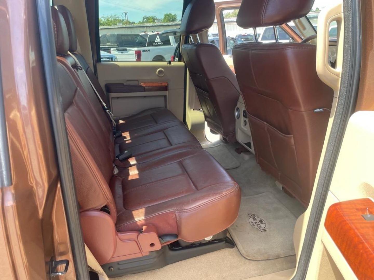2011 Golden Bronze Metallic/Pale Adobe Metallic Ford F-250 Super Duty King Ranch (1FT7W2BTXBE) with an 6.7L Power Stroke 6.7L Biodiesel Turbo V8 400hp 800ft. lbs. Common Rail Direct Injection engine, 6-Speed Shiftable Automatic transmission, located at 800 Riverside Ave, Roseville, CA, 95678, (916) 773-4549, 38.732265, -121.291039 - DIESEL CREW CAB 4X4 FX4 KING RANCH SERVICE RECORDS ON CLEAN CARFAX - Photo#13