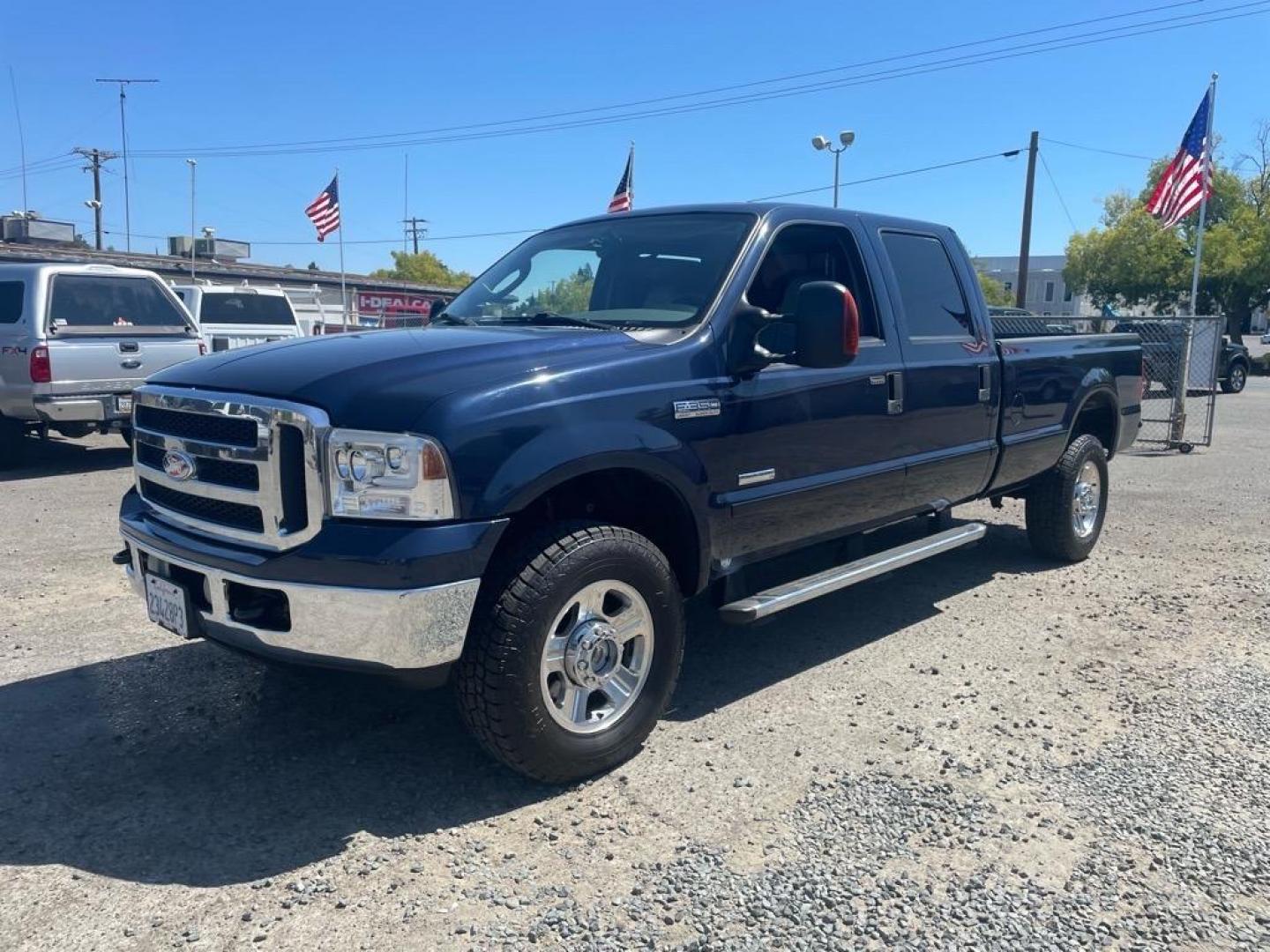 2005 True Blue Clearcoat Metallic Ford F-350 Super Duty Lariat (1FTWW31P25E) with an 6.0L Power Stroke 6.0L Diesel Turbo V8 325hp 560ft. lbs. Direct Injection engine, 5-Speed Automatic transmission, located at 800 Riverside Ave, Roseville, CA, 95678, (916) 773-4549, 38.732265, -121.291039 - DIESEL CREW CAB 4X4 LARIAT LOW MILES BULLET PROOF EGR AND OIL COOLER MOON ROOF CLEAN CARFAX - Photo#0