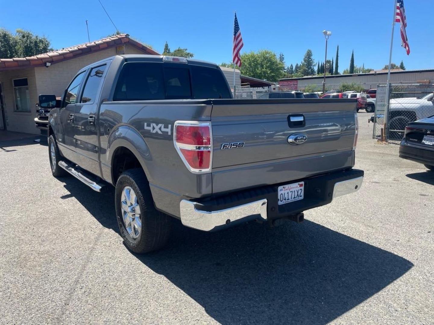 2013 Sterling Gray Metallic Ford F-150 XLT (1FTFW1ET6DK) with an 3.5L EcoBoost 3.5L Twin Turbo V6 365hp 420ft. lbs. Direct Injection engine, 6-Speed Automatic transmission, located at 800 Riverside Ave, Roseville, CA, 95678, (916) 773-4549, 38.732265, -121.291039 - 4X4 SUPERCREW XLT ECO BOOST LOW MILES SERVICE RECORDS - Photo#2