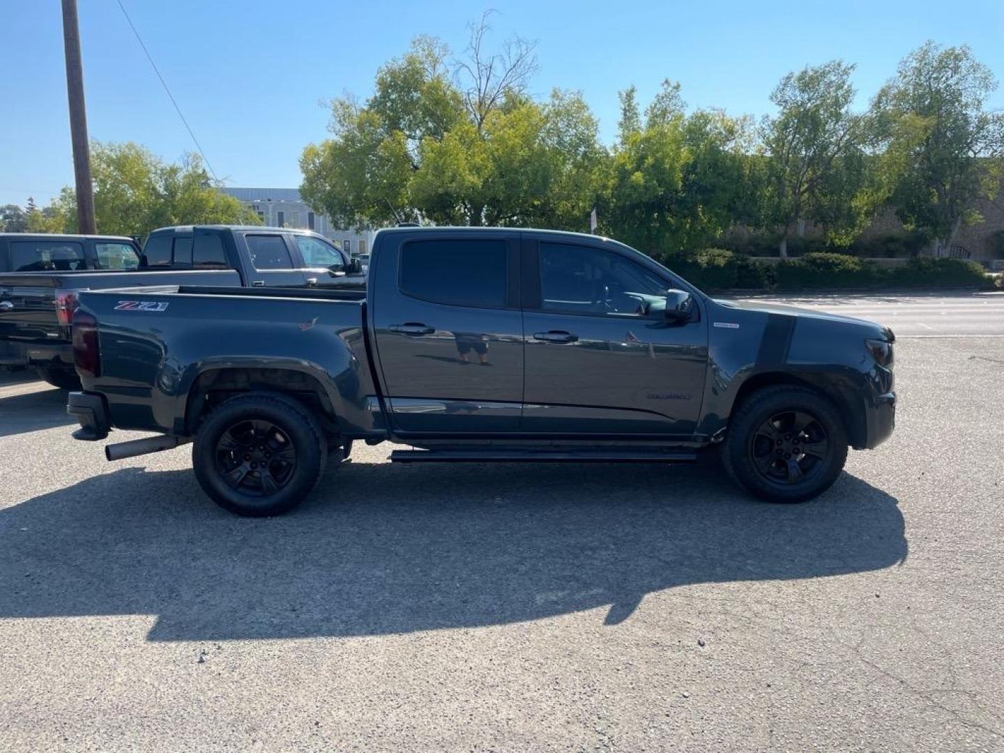 2018 Deepwood Green Metallic Chevrolet Colorado Z71 (1GCPTDE13J1) with an 0.0 Duramax 2.8L Diesel Turbo I4 181hp 369ft. lbs. Common Rail Direct Injection engine, 8-Speed Shiftable Automatic transmission, located at 800 Riverside Ave, Roseville, CA, 95678, (916) 773-4549, 38.732265, -121.291039 - Photo#5