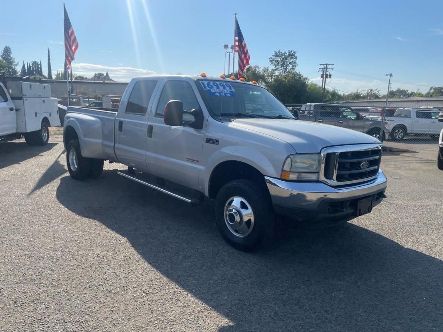 2004 Silver Clearcoat Metallic Ford F-350 Super Duty XLT (1FTWW33P94E) with an Power Stroke 6.0L Diesel Turbo V8 325hp 560ft. lbs. Other engine, 5-Speed Automatic transmission, located at 800 Riverside Ave, Roseville, CA, 95678, (916) 773-4549, 38.732265, -121.291039 - DIESEL CREW CAB 4X4 XLT ONE OWNER SERVICE RECORDS - Photo#1