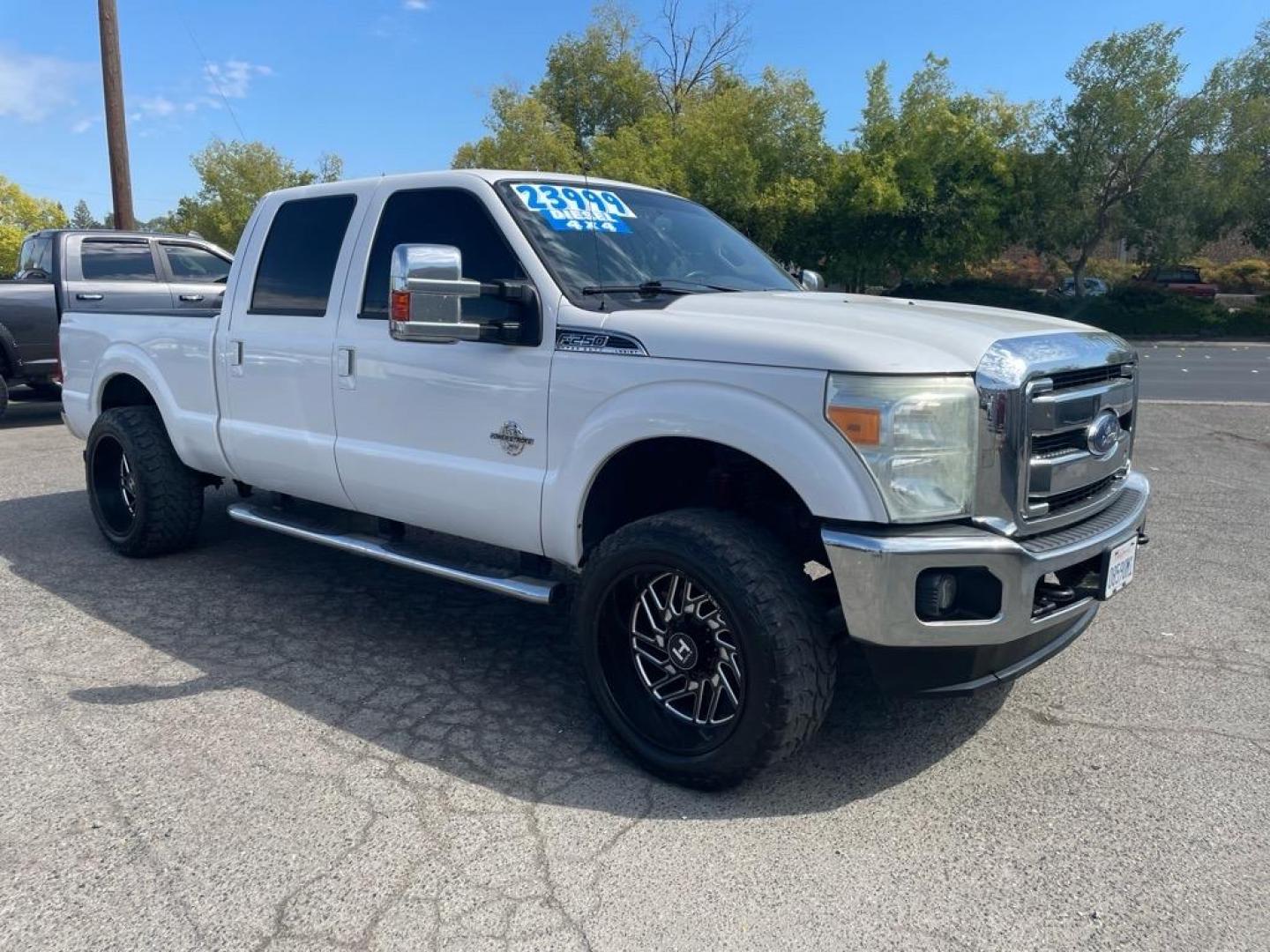 2014 Oxford White Ford F-250 Super Duty Lariat (1FT7W2BT5EE) with an 6.7L Power Stroke 6.7L Biodiesel Turbo V8 400hp 800ft. lbs. Common Rail Direct Injection engine, 6-Speed Shiftable Automatic transmission, located at 800 Riverside Ave, Roseville, CA, 95678, (916) 773-4549, 38.732265, -121.291039 - DIESEL CREW CAB 4X4 LARIAT CLEAN CARFAX - Photo#1