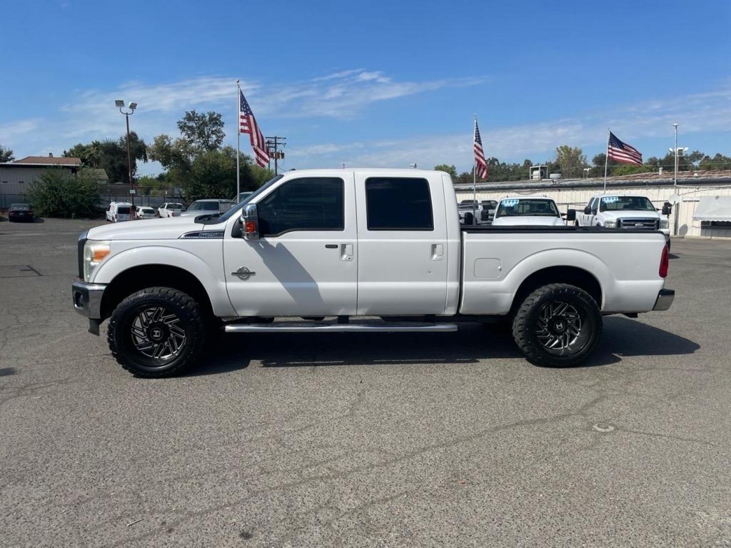 2014 Oxford White Ford F-250 Super Duty Lariat (1FT7W2BT5EE) with an 6.7L Power Stroke 6.7L Biodiesel Turbo V8 400hp 800ft. lbs. Common Rail Direct Injection engine, 6-Speed Shiftable Automatic transmission, located at 800 Riverside Ave, Roseville, CA, 95678, (916) 773-4549, 38.732265, -121.291039 - DIESEL CREW CAB 4X4 LARIAT CLEAN CARFAX - Photo#4