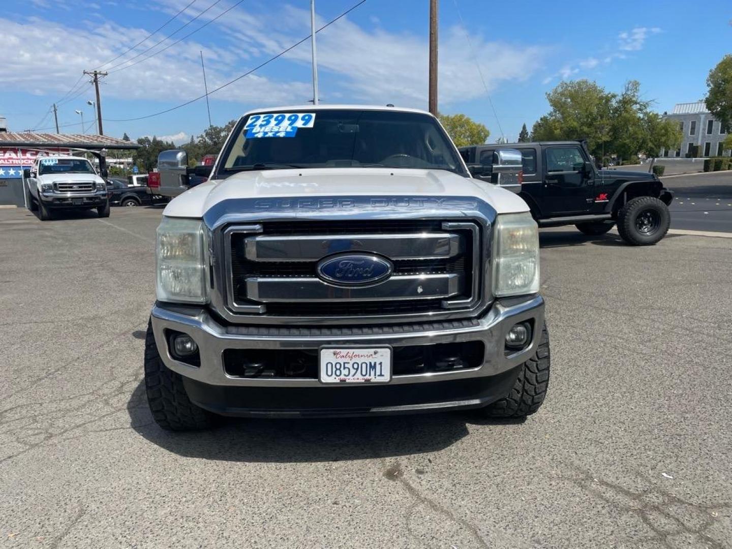 2014 Oxford White Ford F-250 Super Duty Lariat (1FT7W2BT5EE) with an 6.7L Power Stroke 6.7L Biodiesel Turbo V8 400hp 800ft. lbs. Common Rail Direct Injection engine, 6-Speed Shiftable Automatic transmission, located at 800 Riverside Ave, Roseville, CA, 95678, (916) 773-4549, 38.732265, -121.291039 - DIESEL CREW CAB 4X4 LARIAT CLEAN CARFAX - Photo#7