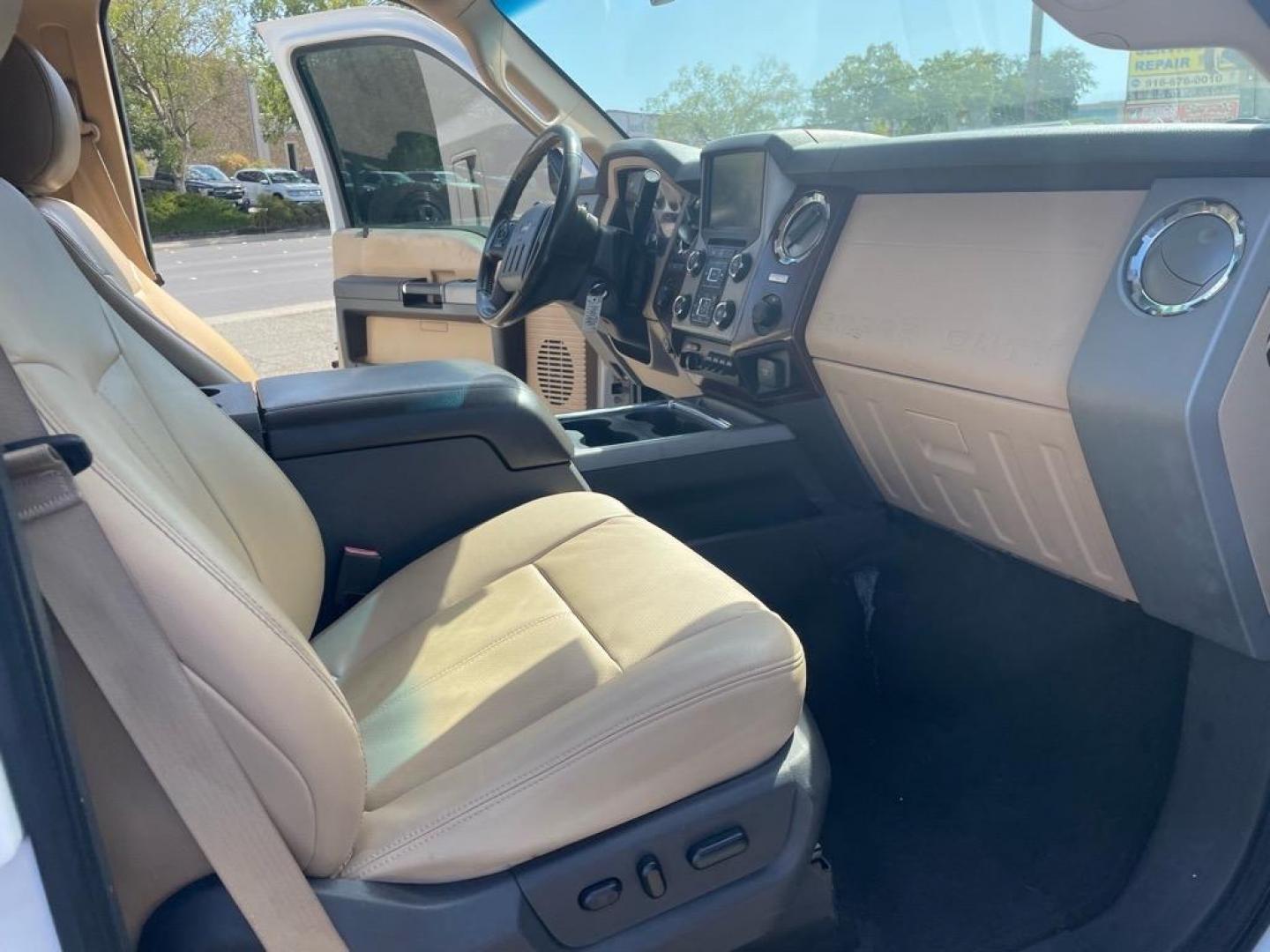 2014 Oxford White Ford F-250 Super Duty Lariat (1FT7W2BT5EE) with an 6.7L Power Stroke 6.7L Biodiesel Turbo V8 400hp 800ft. lbs. Common Rail Direct Injection engine, 6-Speed Shiftable Automatic transmission, located at 800 Riverside Ave, Roseville, CA, 95678, (916) 773-4549, 38.732265, -121.291039 - DIESEL CREW CAB 4X4 LARIAT CLEAN CARFAX - Photo#12
